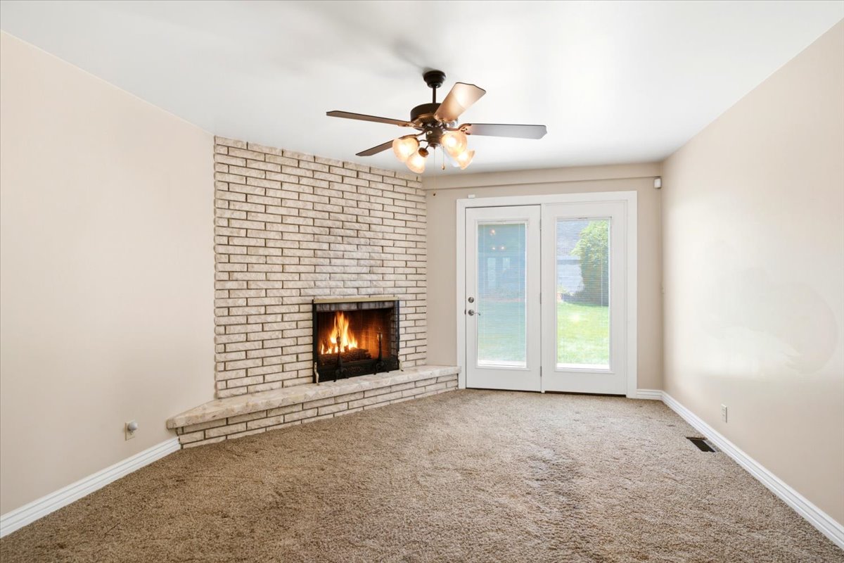 Corner brick fireplace.