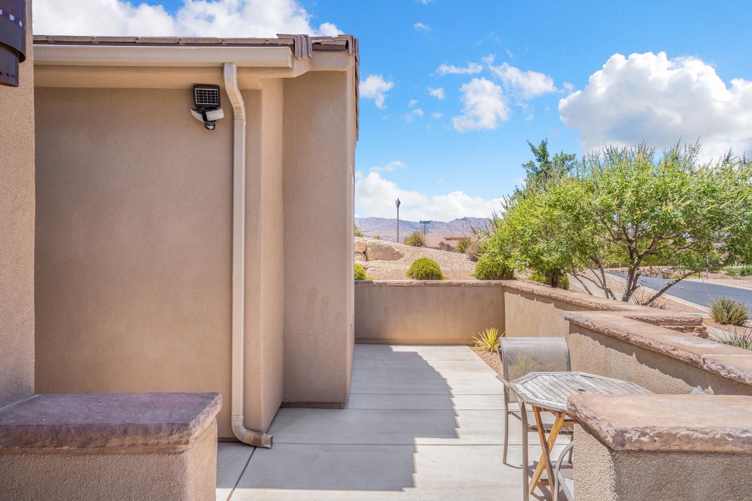 Stucco exterior with concrete patio