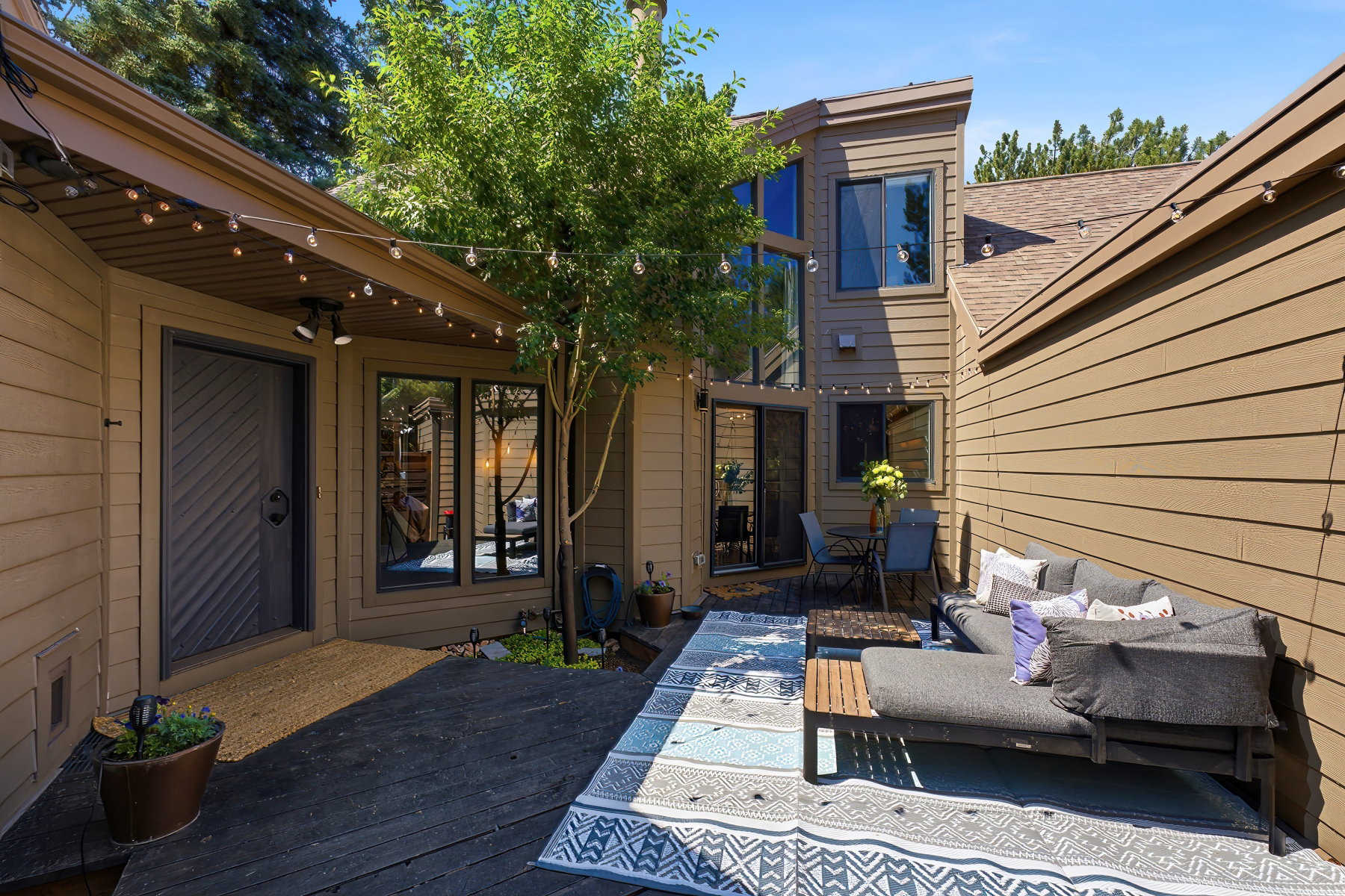 Outdoor patio with dark wood-finish decking