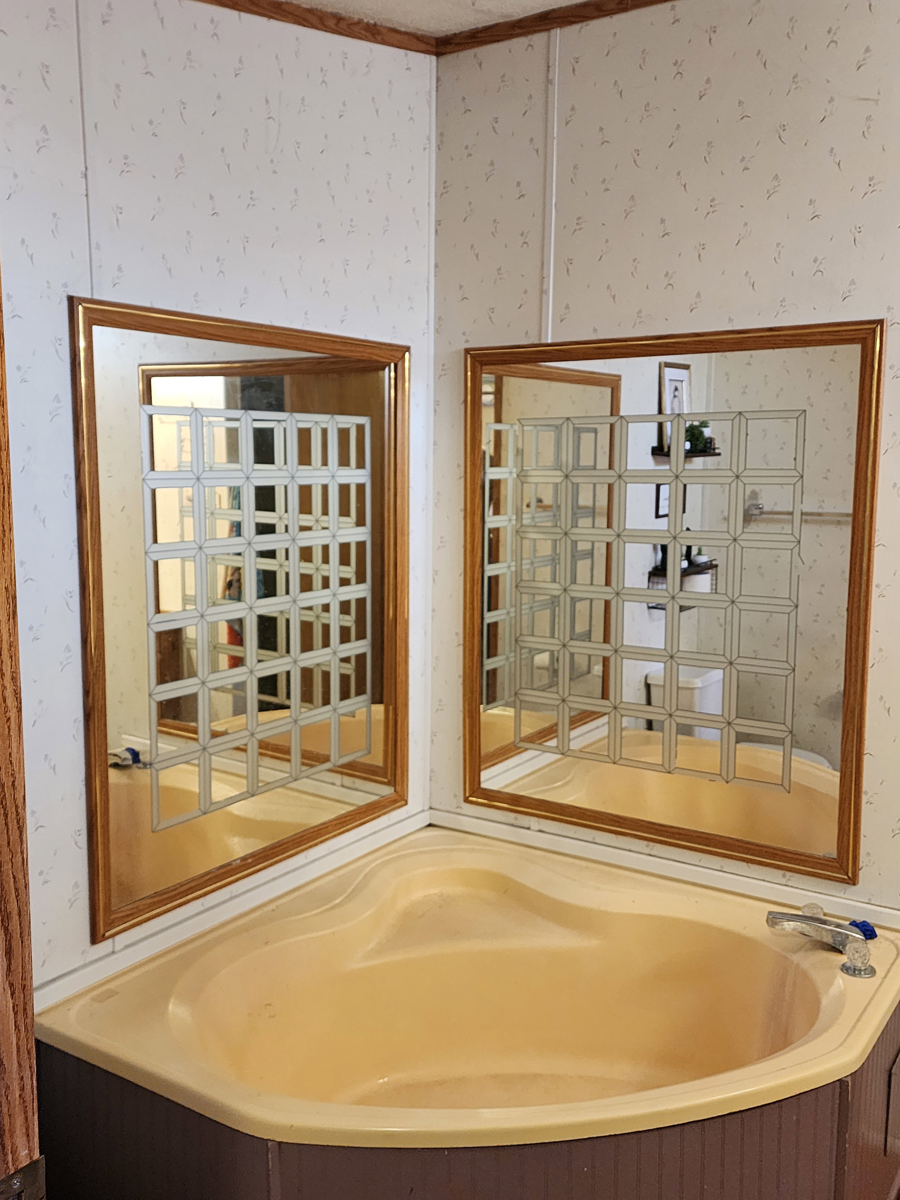Corner soaking tub with integrated seating