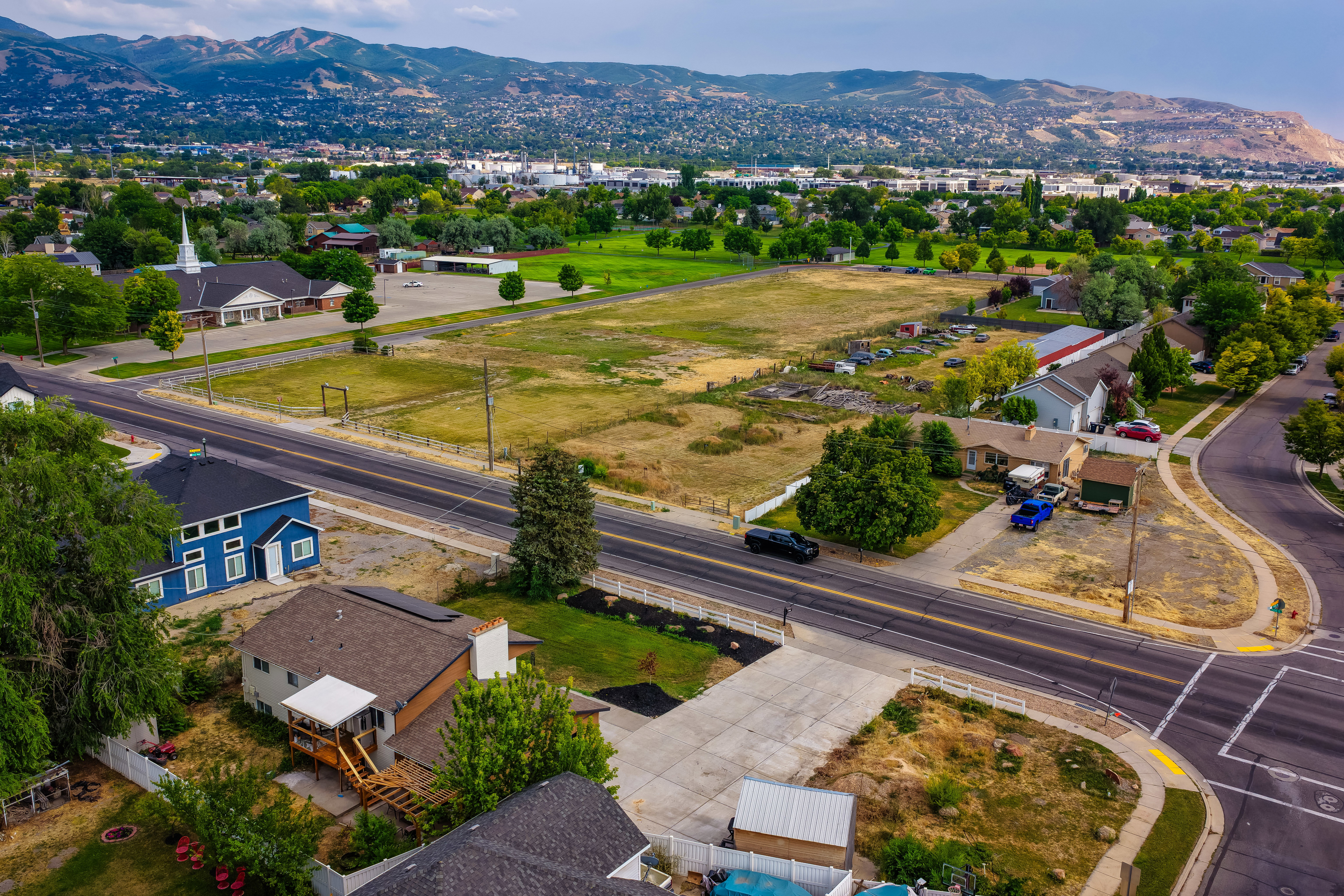 Mountain backdrop framing the cityscape and surrounding green spaces