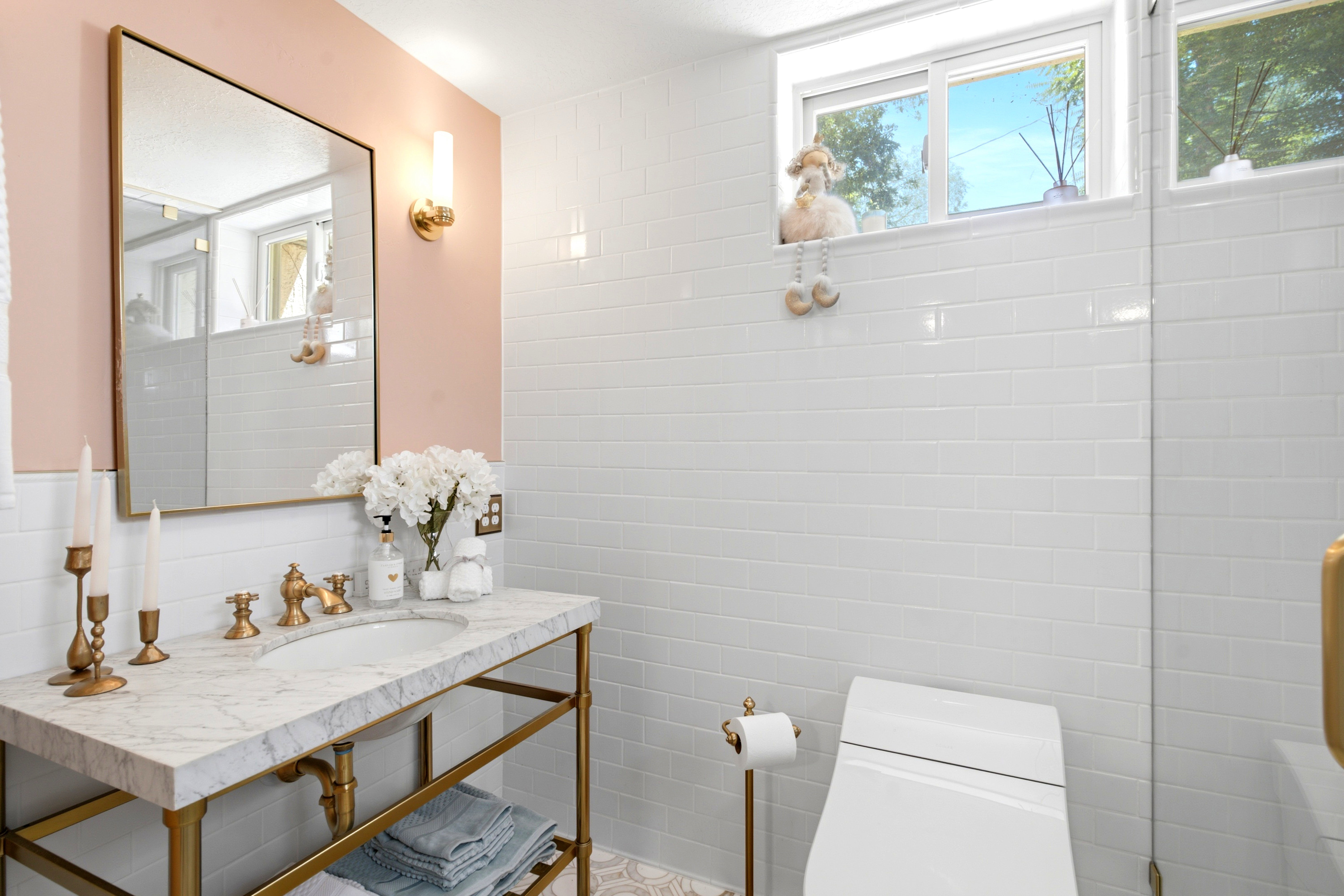 Includes a bidet smart toilet and a heated towel rack.