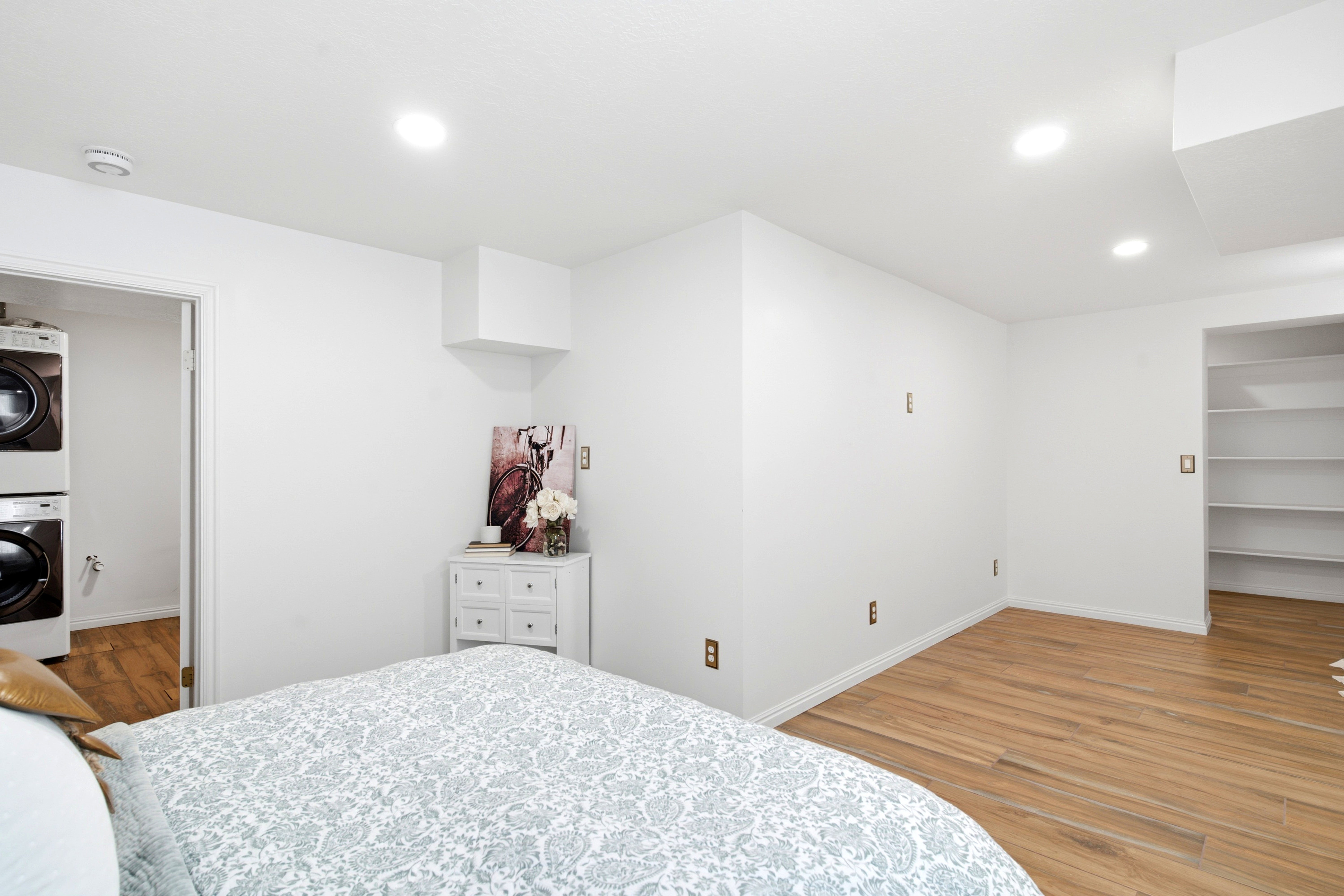 Finished basement with bedroom and space for an office.