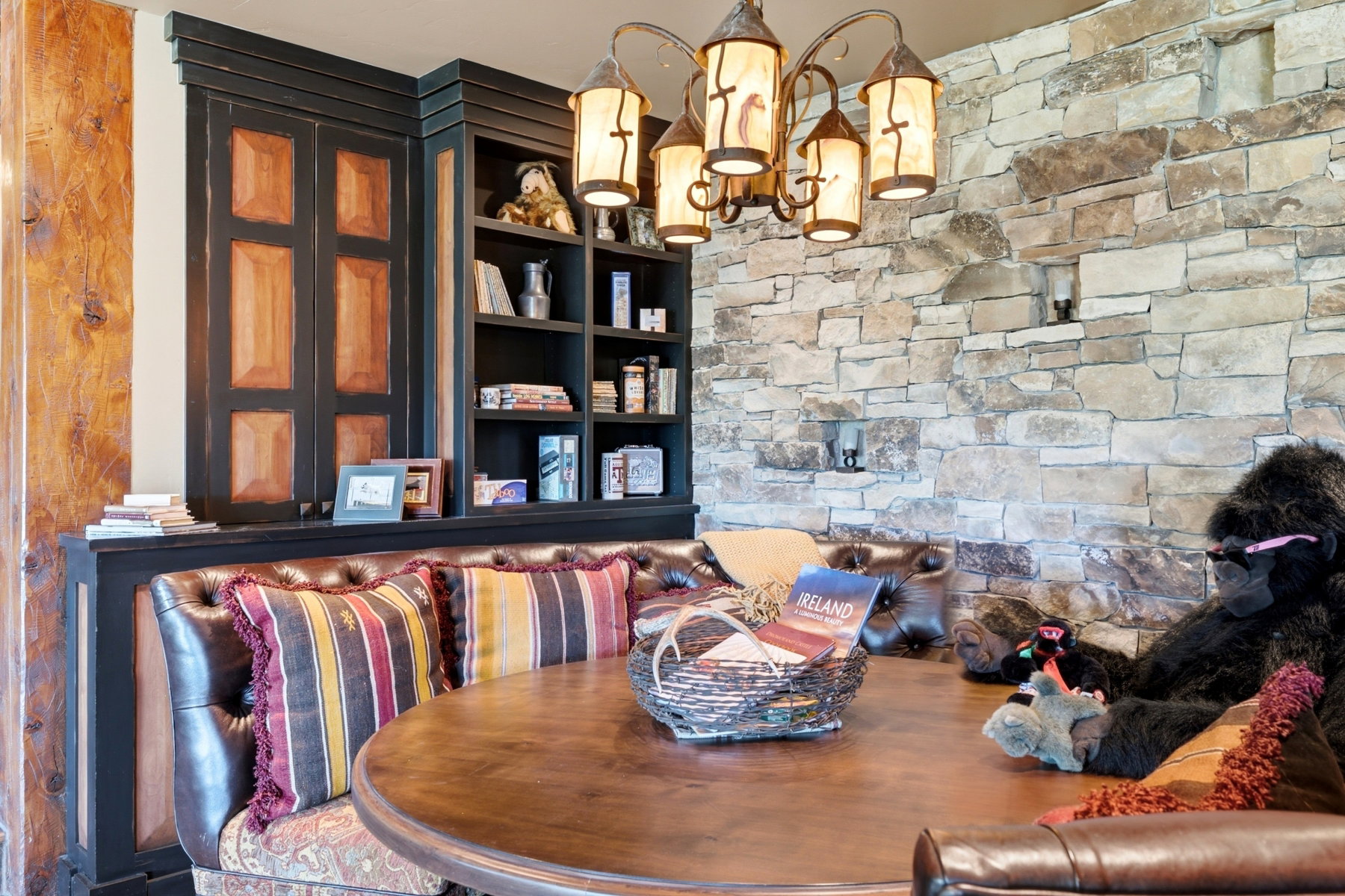 Built-in seating with tufted leather upholstery and patterned fabric