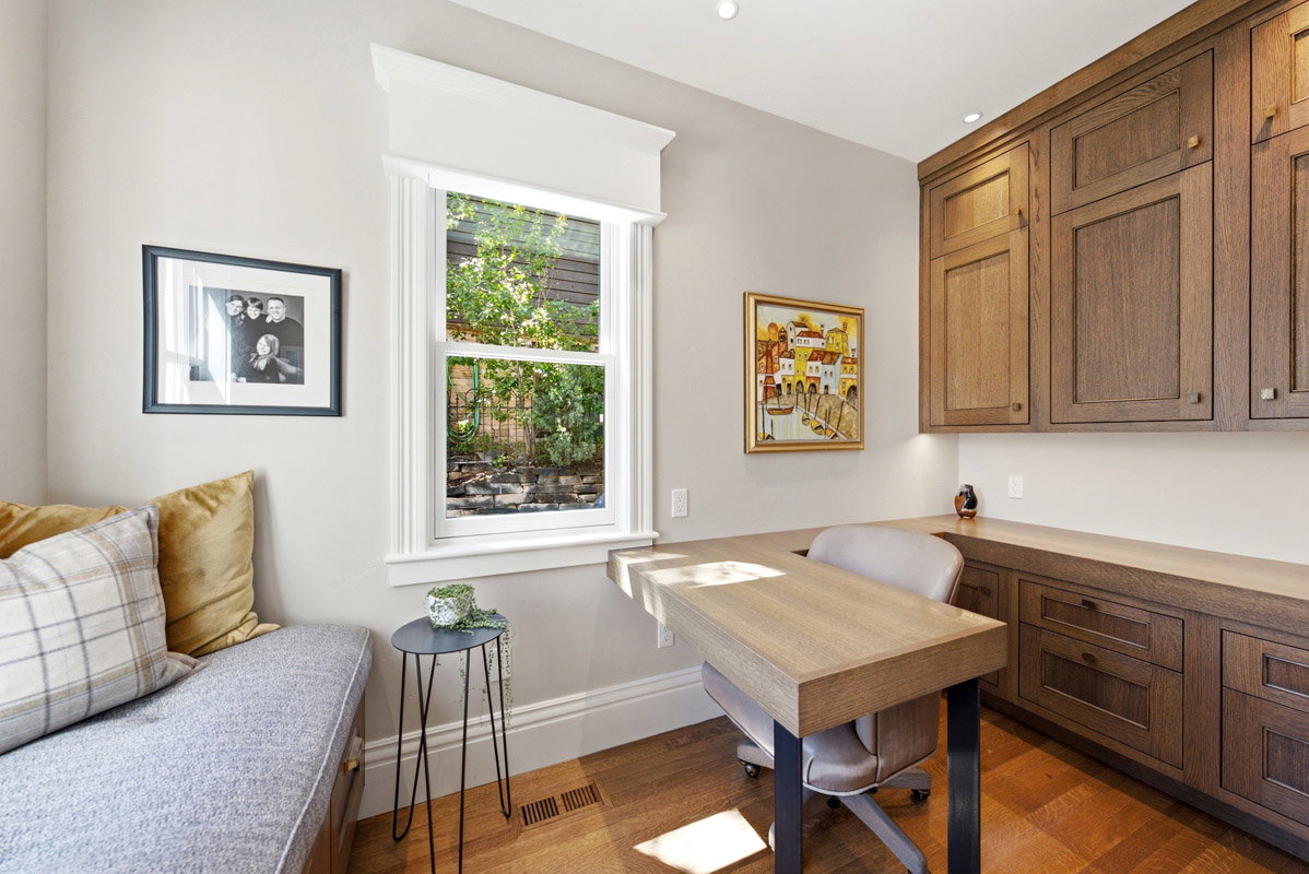 Custom built-in desk with integrated cabinetry and task lighting