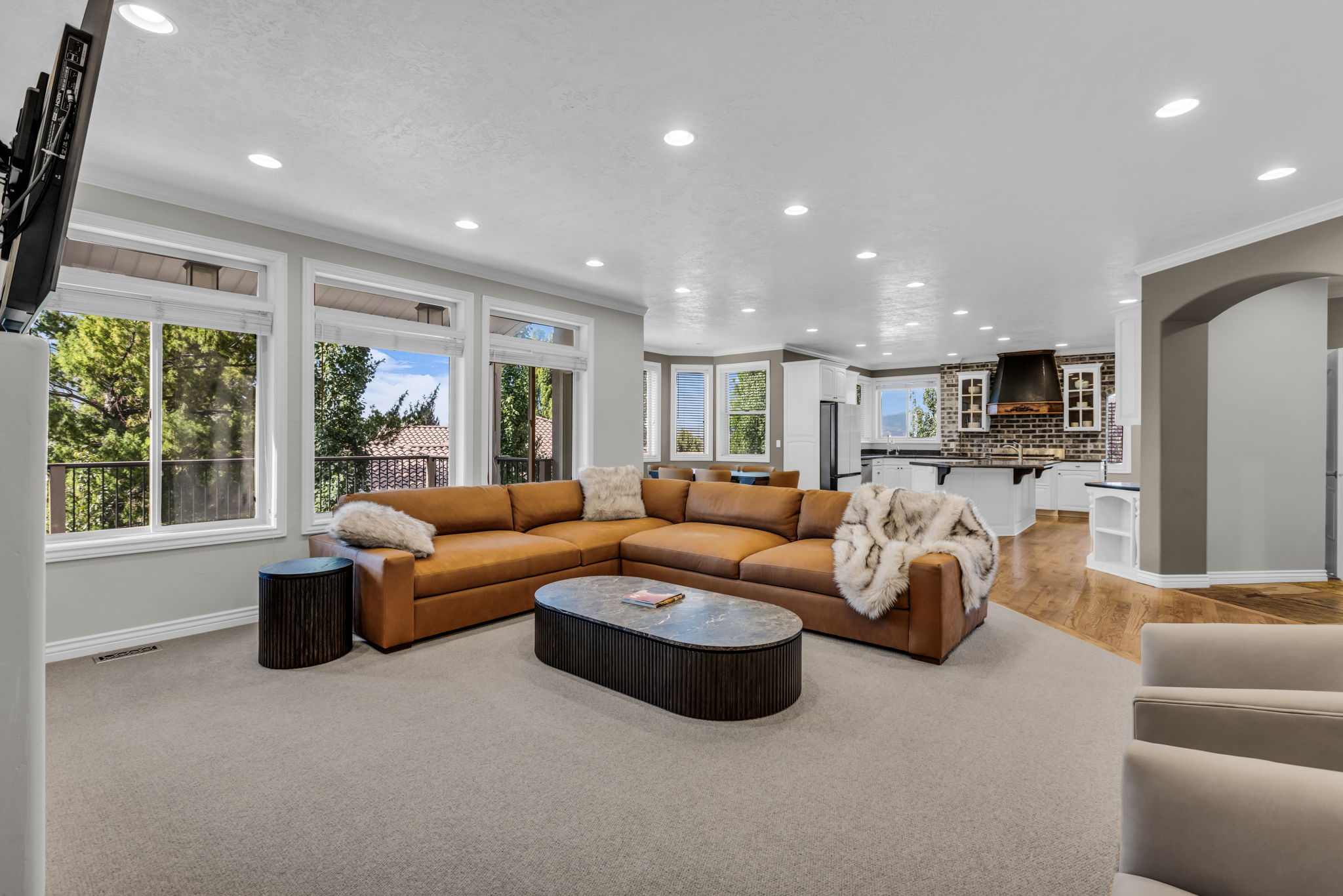 Open concept living area featuring recessed lighting