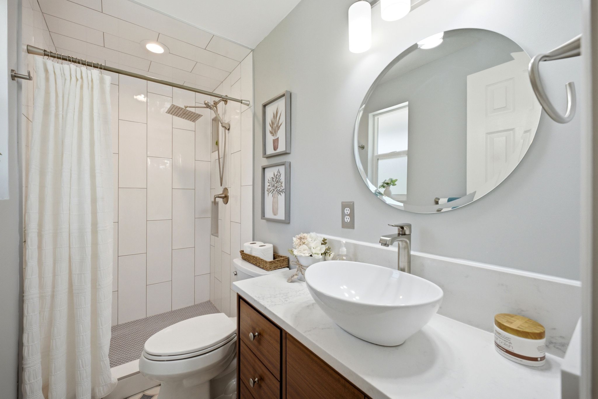 Master Modern bathroom featuring a walk-in shower with vertical subway tile, dual shower heads, and a tiled floor