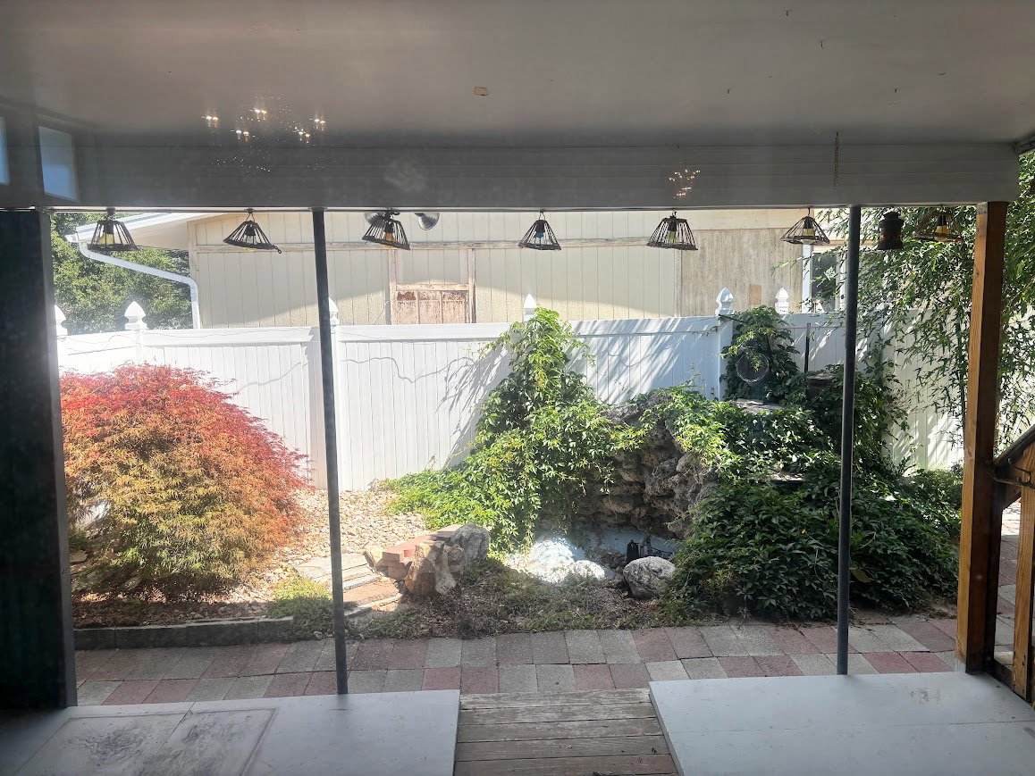 View of the patio from the living room sliding glass doors