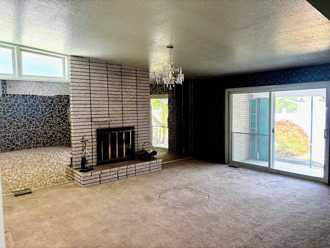 The sliding glass doors lead out to a patio