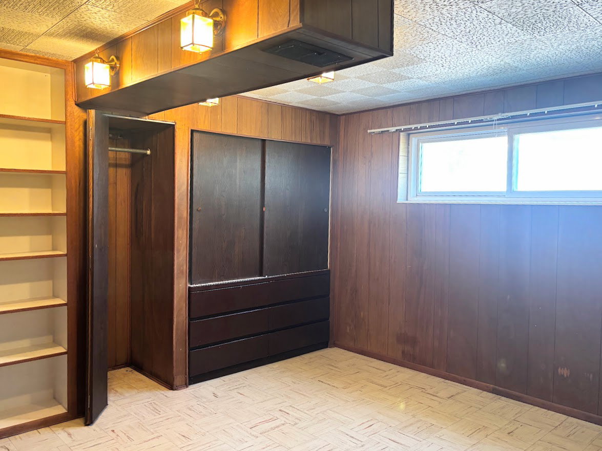 View of the closets in the downstairs bedroom