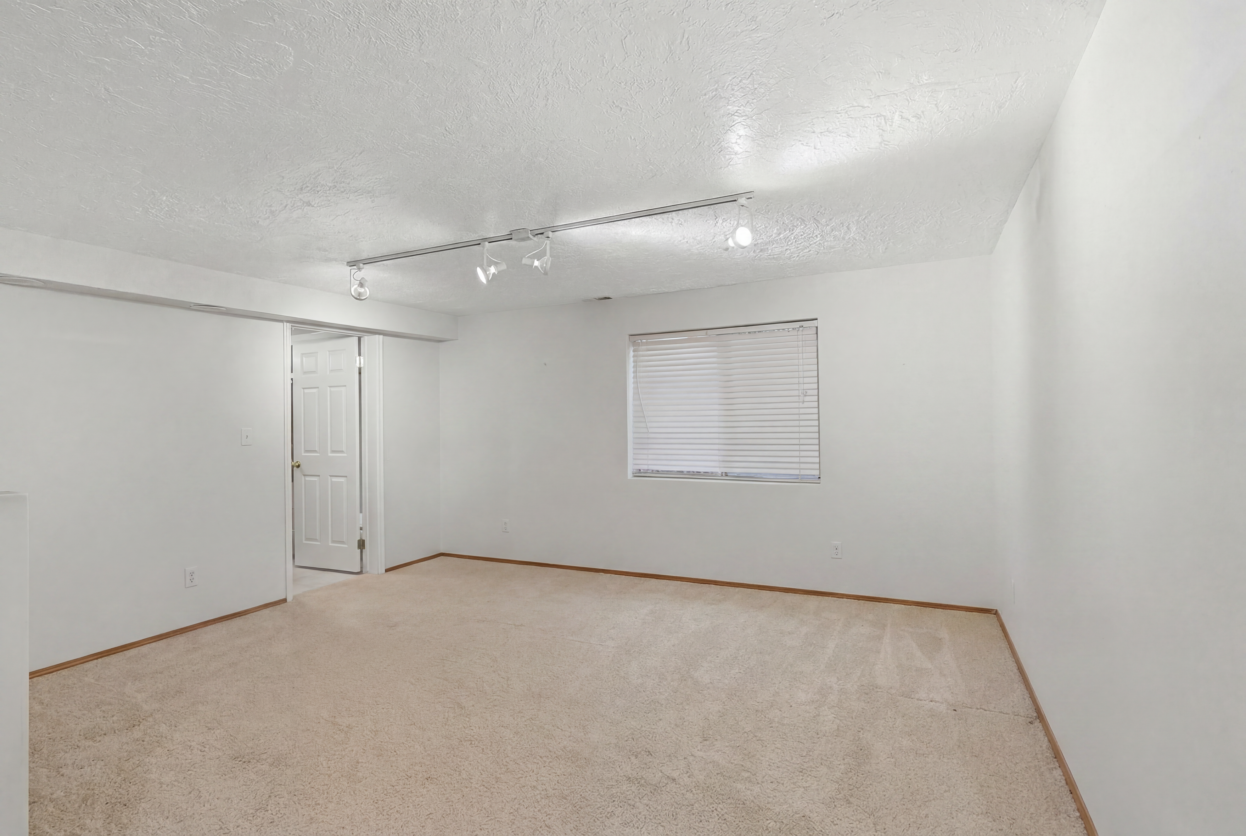 AI produced empty room (now being used as a bedroom)