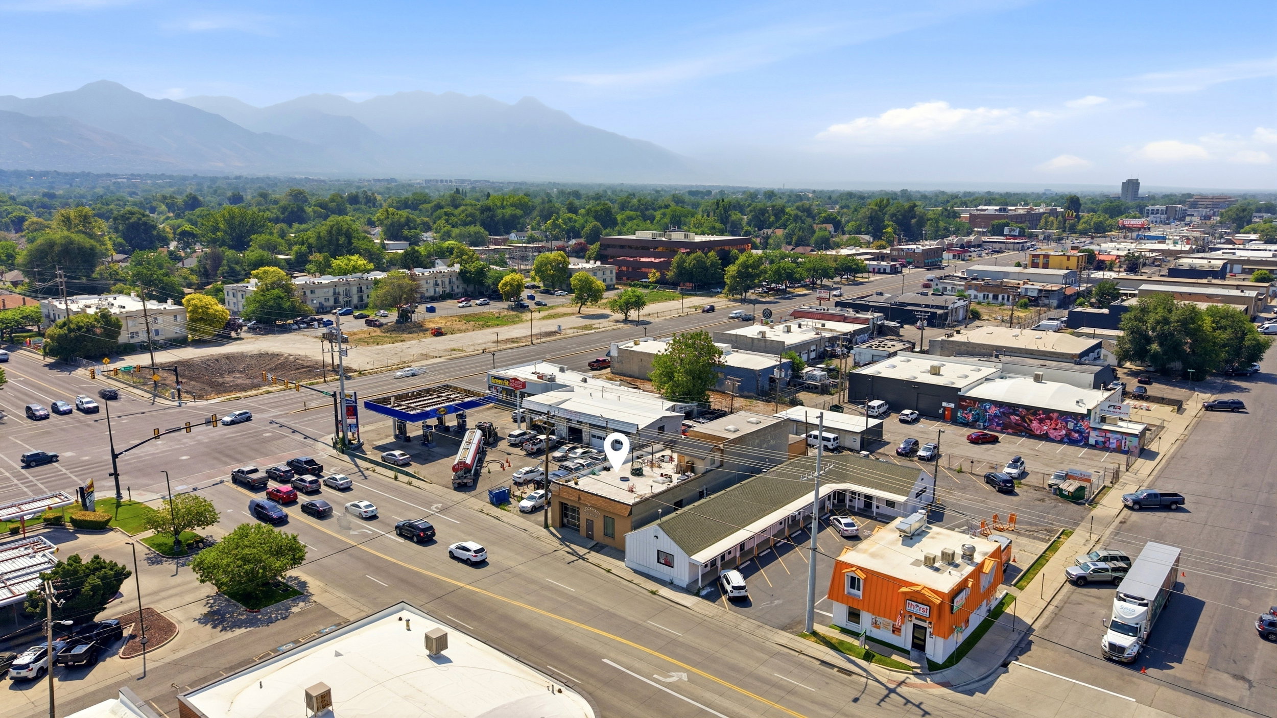 Aerial view showcasing a commercial area with multiple buildings