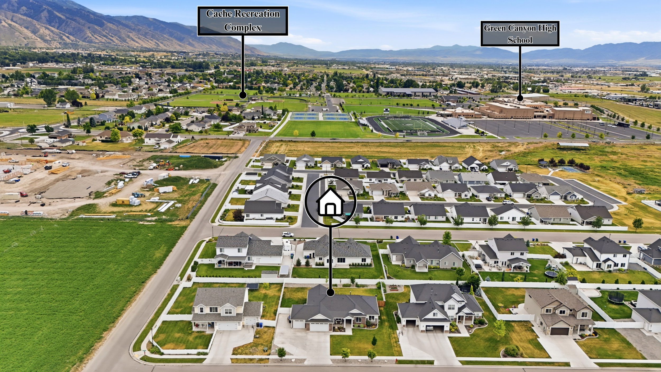 Aerial perspective showcasing a developed residential neighborhood with structured streets and individual homes