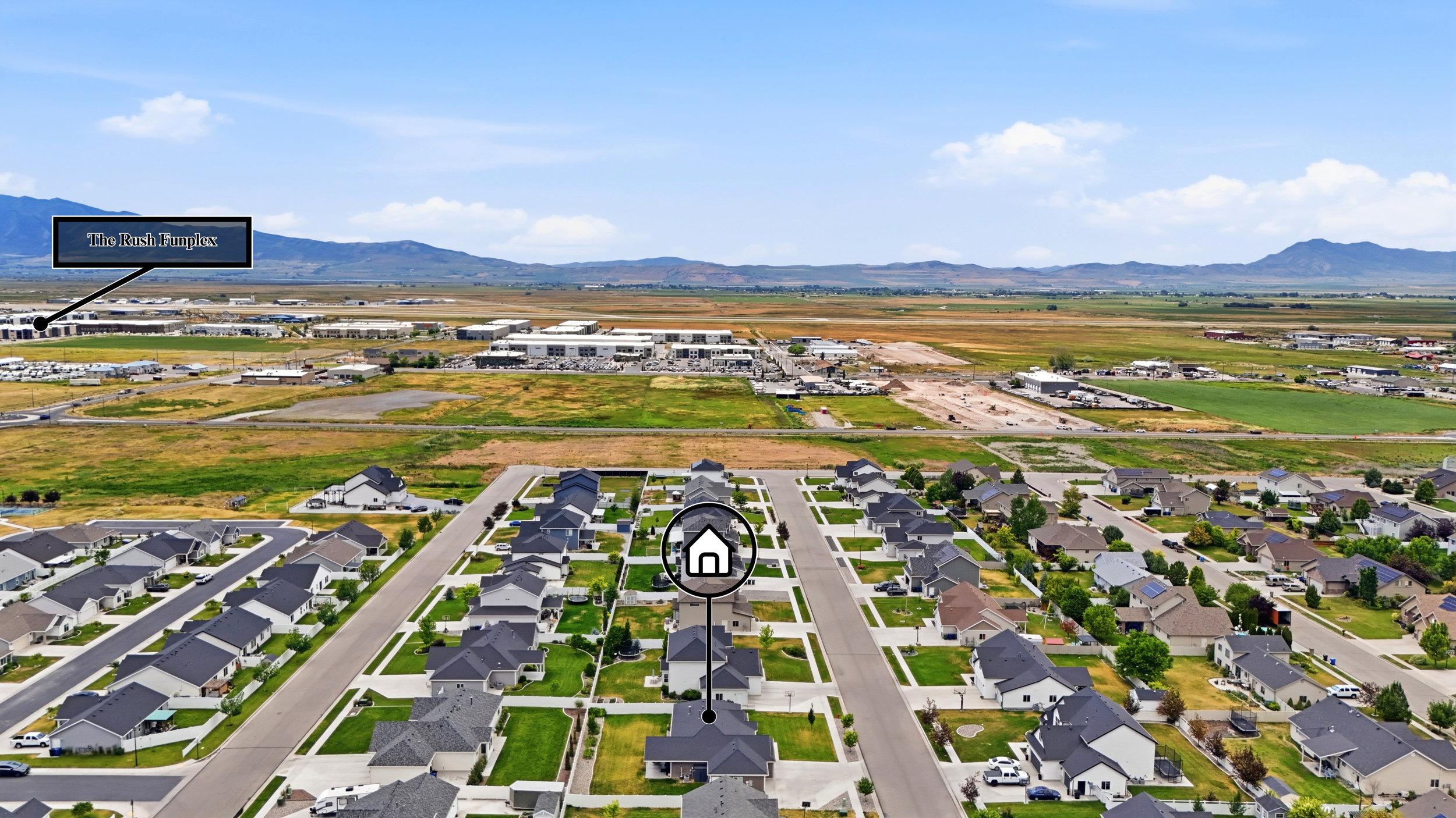 Aerial perspective showcasing a residential development with individual homes and paved streets