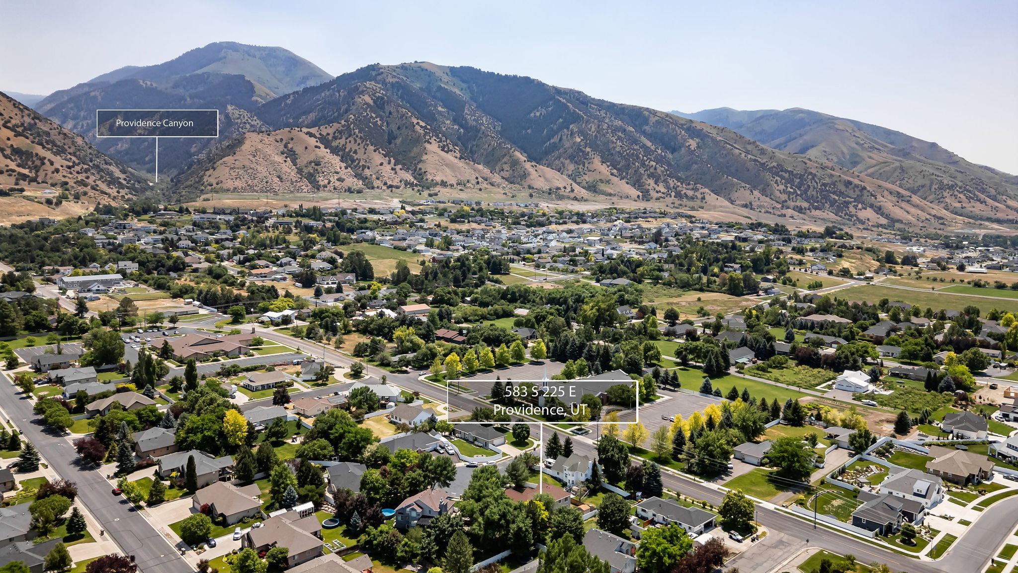 Aerial perspective showcasing a residential neighborhood with varied housing styles