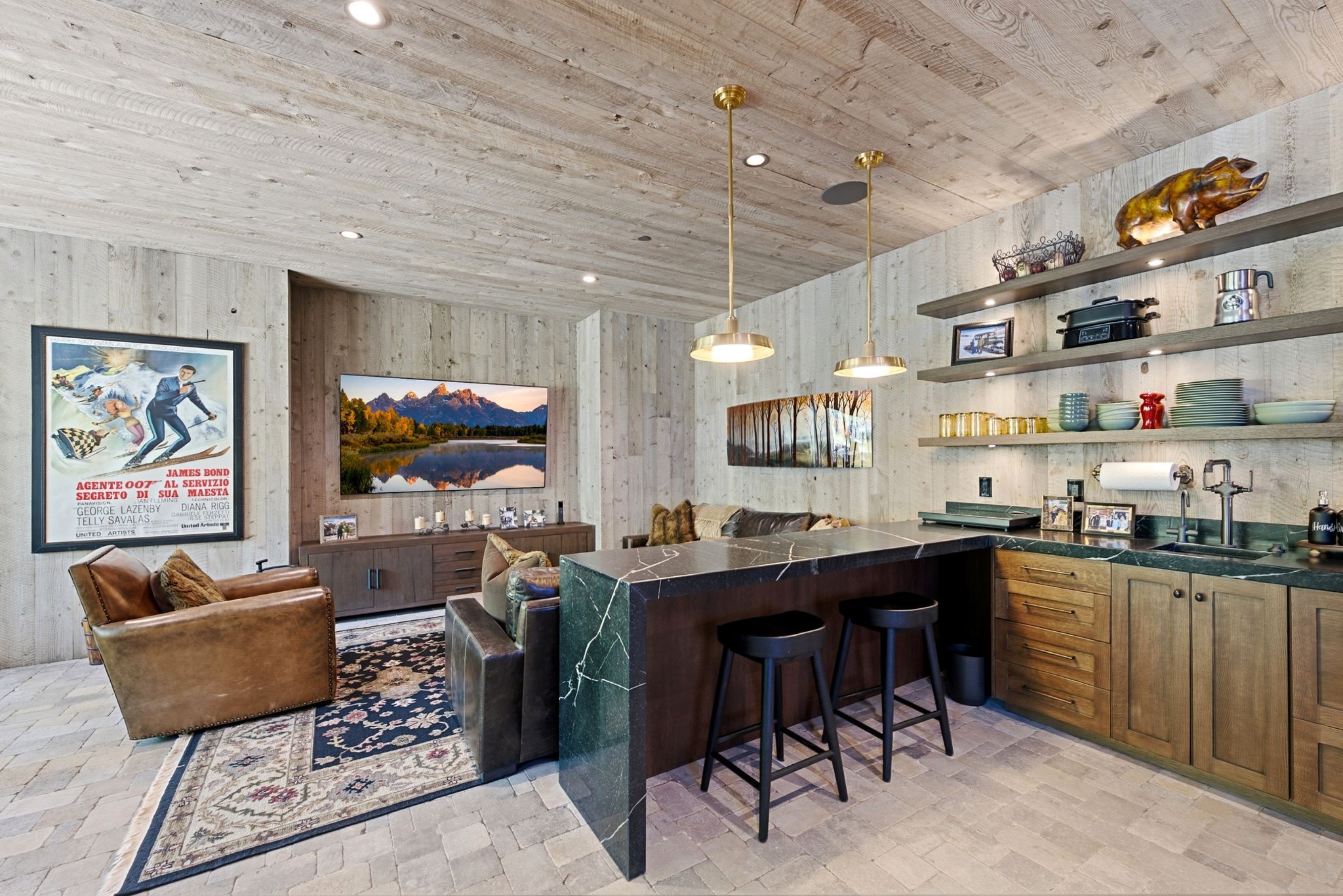 Reclaimed wood-paneled walls and ceiling define this open living space