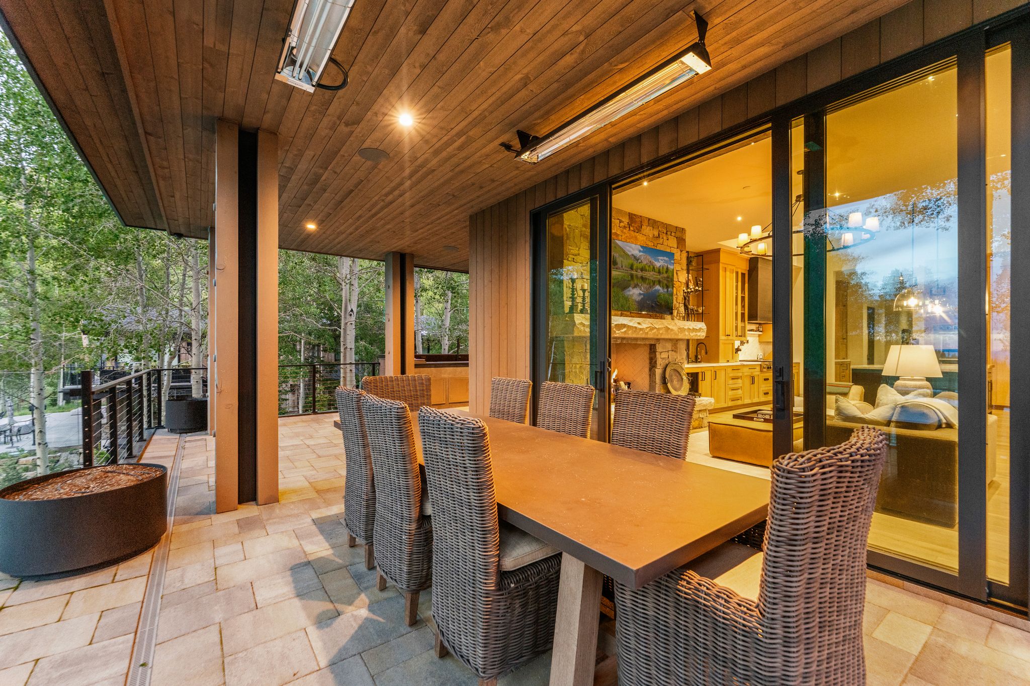 Covered patio featuring wood-finish ceiling, recessed lighting, and wall-mounted heaters