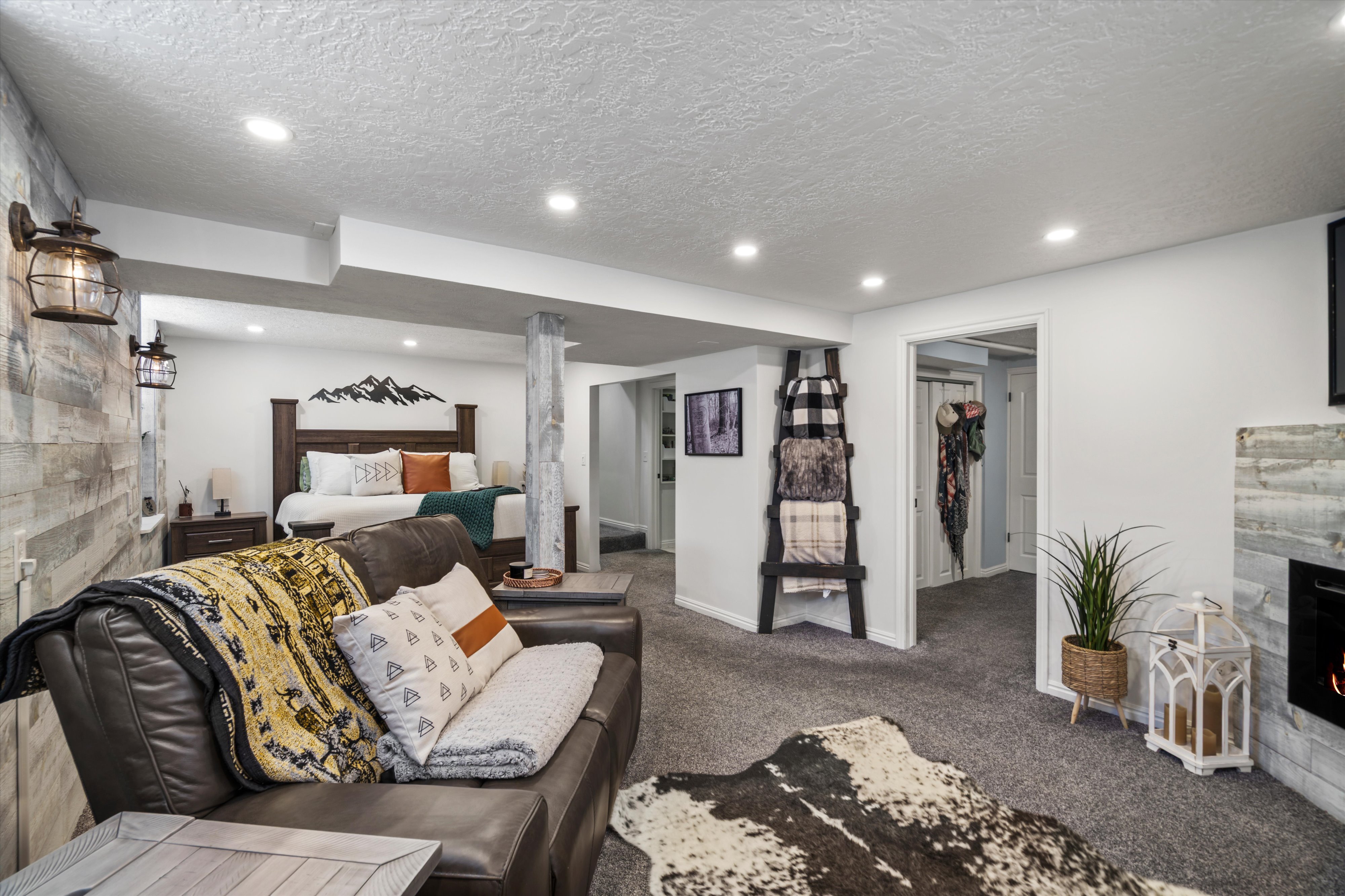 Carpeted flex room featuring recessed lighting, and a fireplace. Used as large primary bedroom currently.
