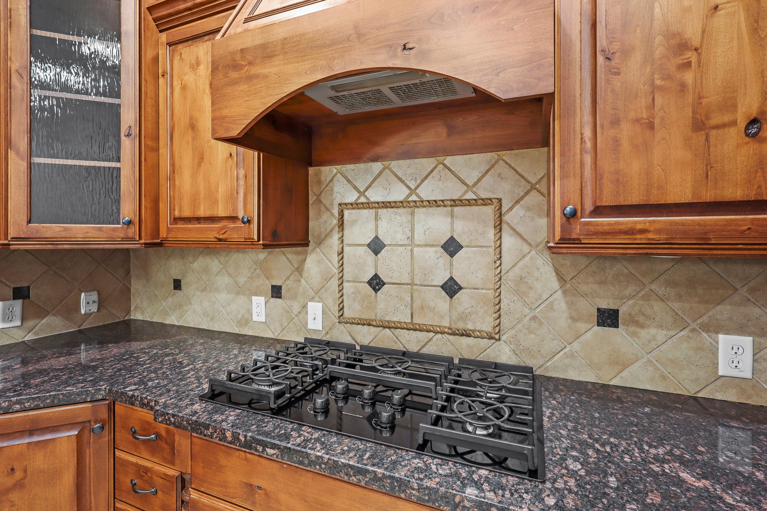Kitchen space featuring a gas cooktop.