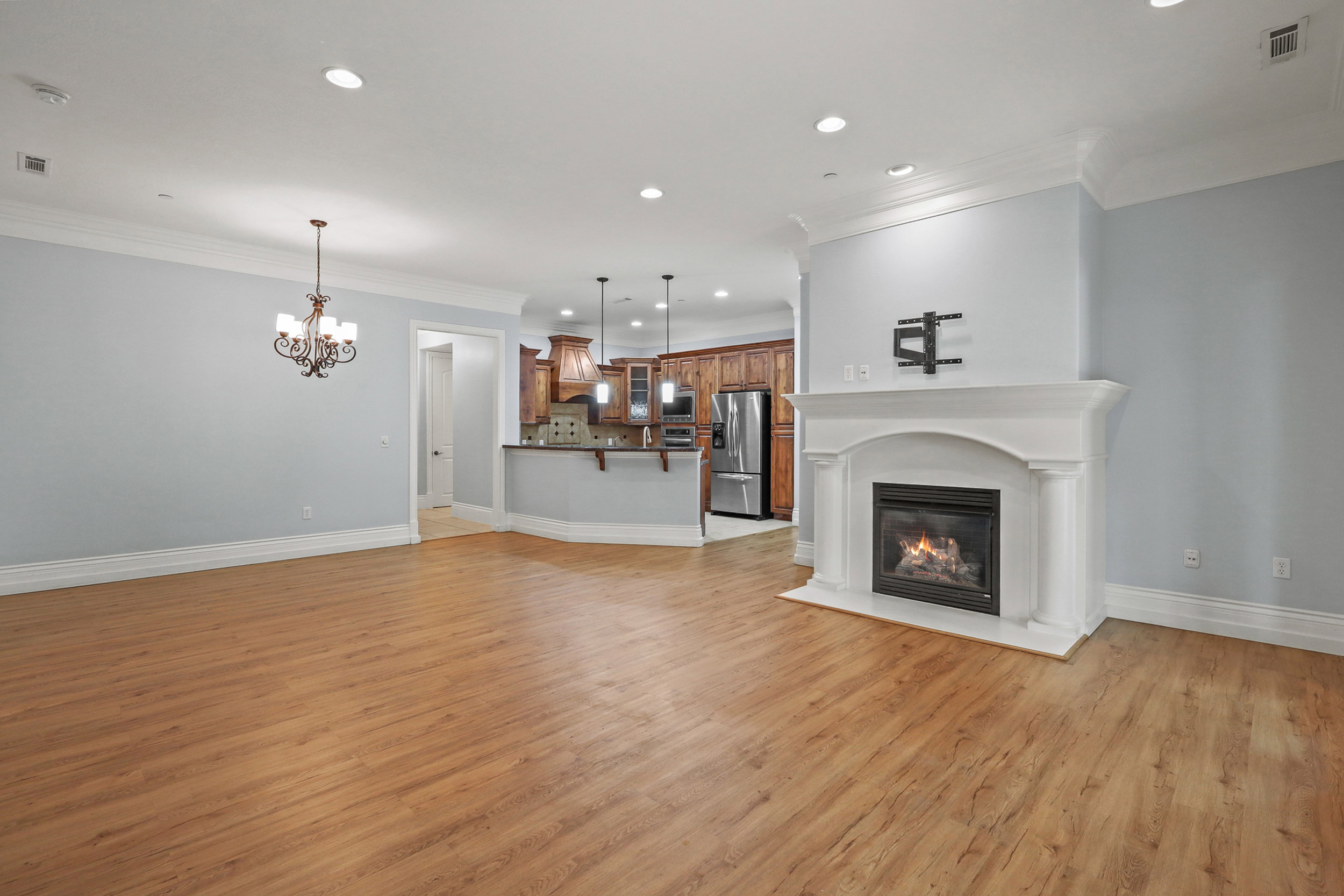 Open concept kitchen, living room, and dining room.