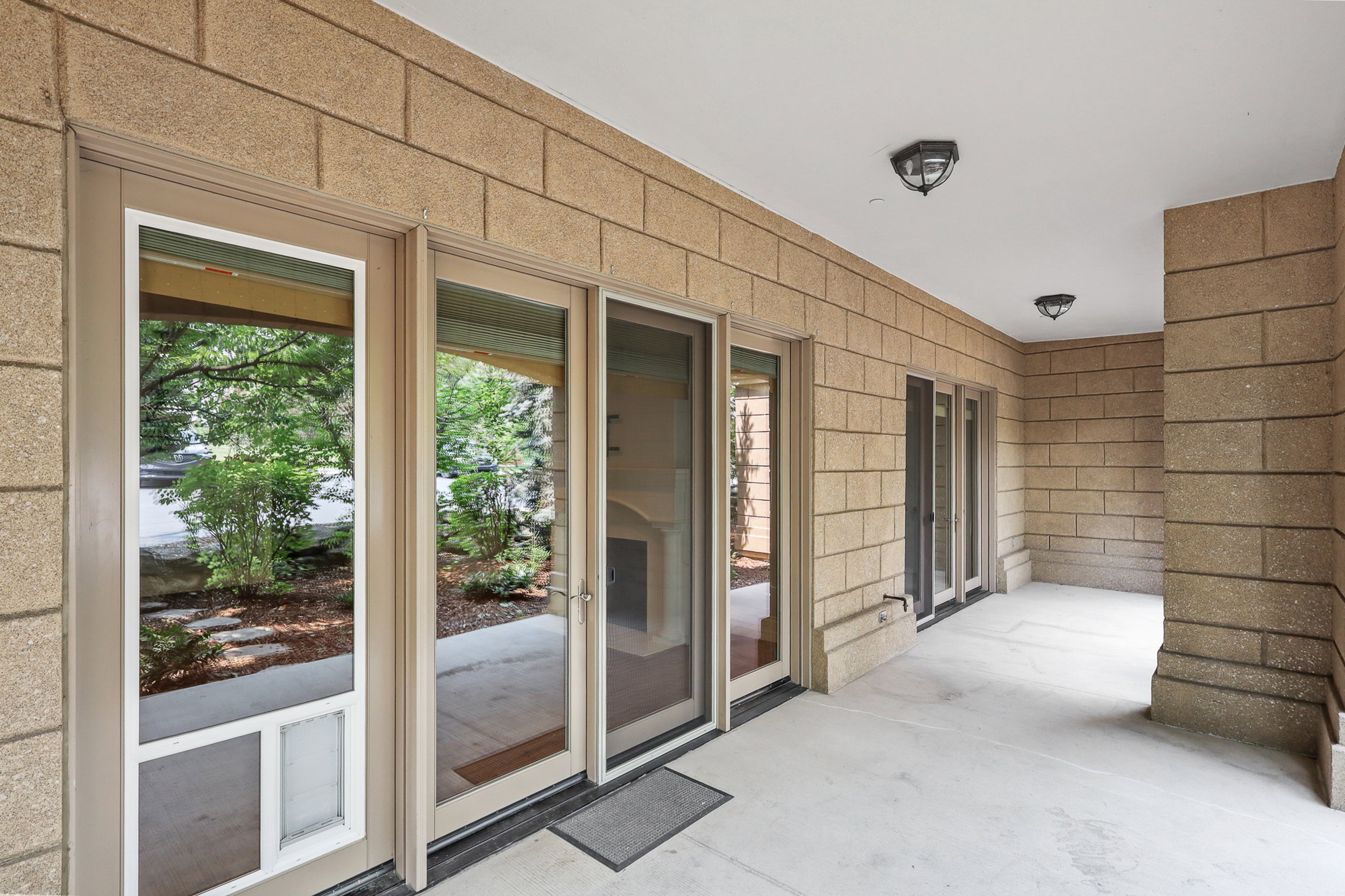Covered patio off of the living room and bedroom #3