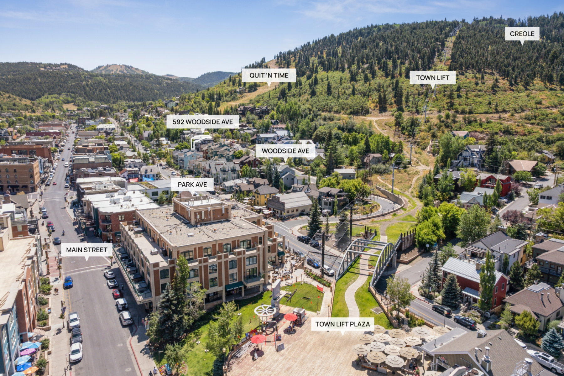Aerial perspective highlighting a vibrant mountain town setting