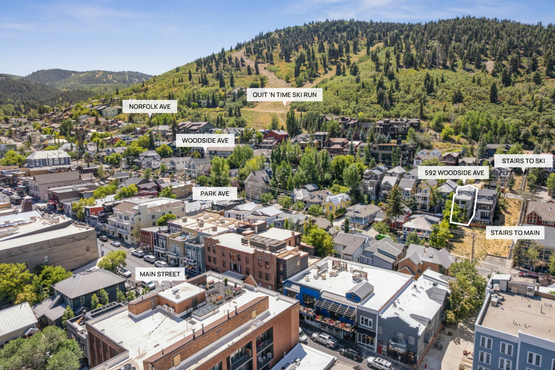 Aerial perspective showcasing a multi-story residence at 592 Woodside Avenue