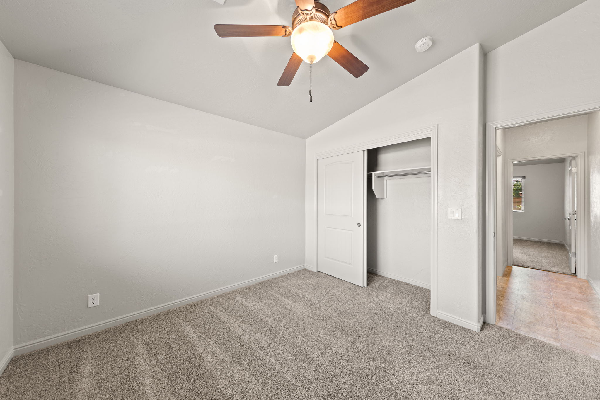 Neutral-toned carpeting throughout