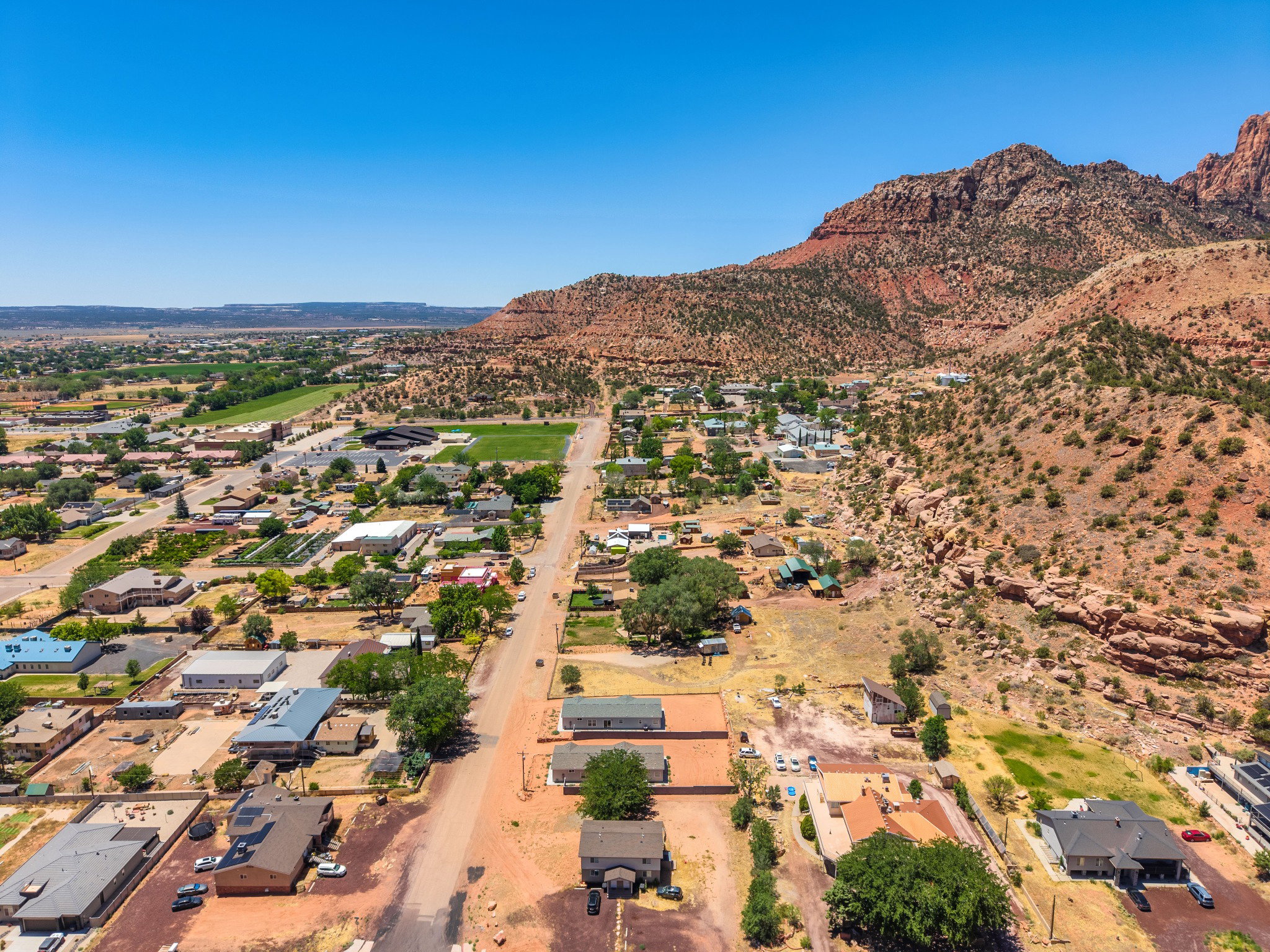 Aerial perspective showcasing a residential area with varied housing styles