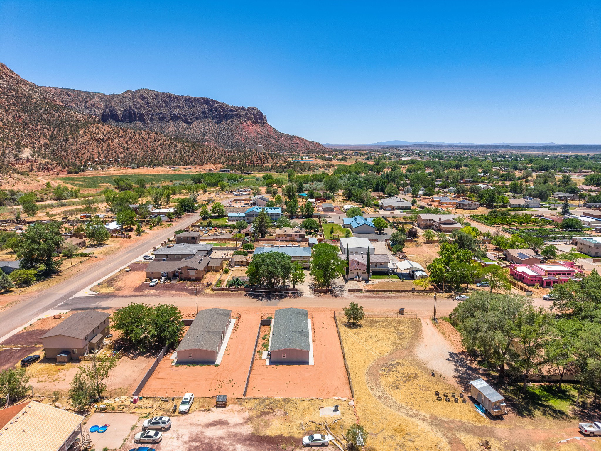 Aerial perspective of a residential area with varied housing styles
