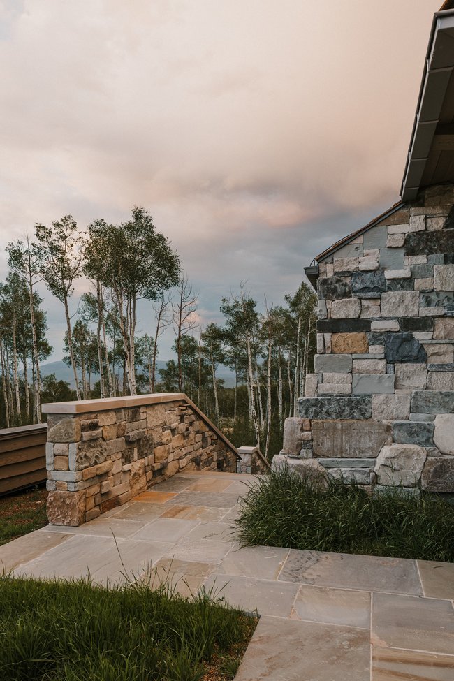 Stone exterior featuring varying block sizes and natural tones