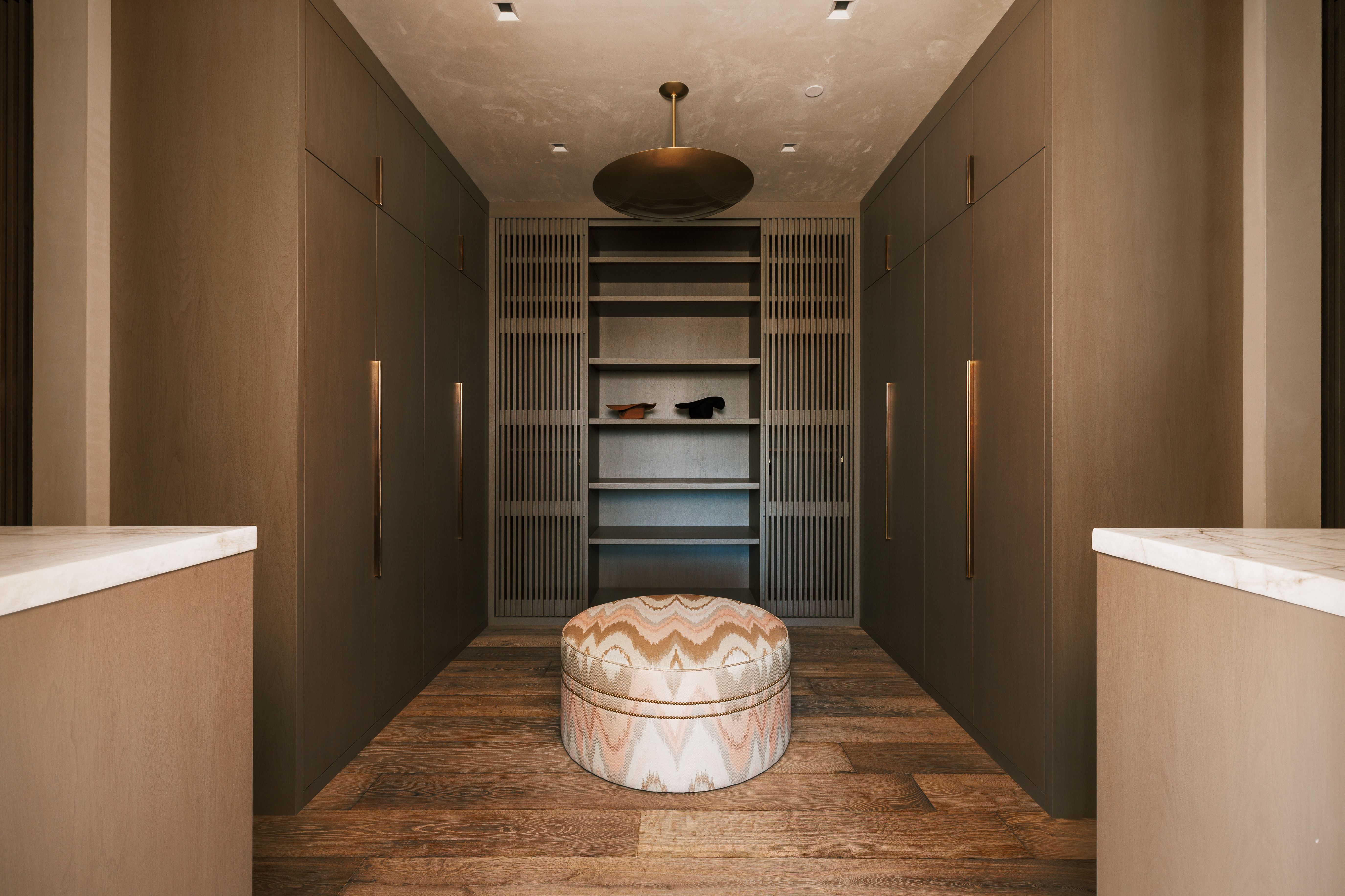Custom built-in cabinetry with integrated lighting and sleek hardware