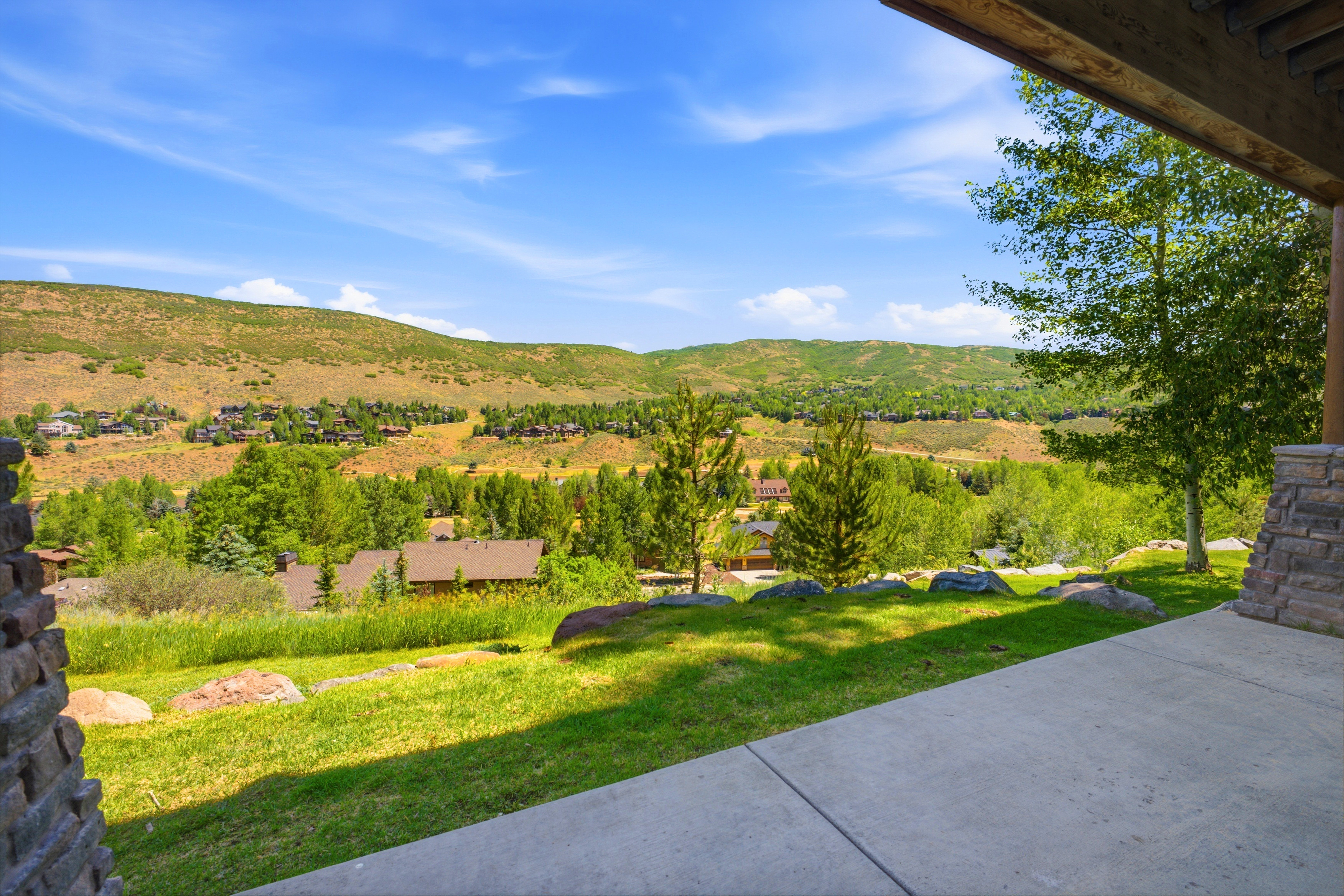 Expansive outdoor patio with concrete flooring