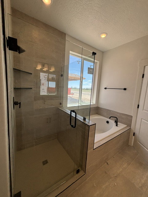 PRIMARY SUITE INCLUDES TILED  SEPARATE GARDEN TUB & SHOWER!