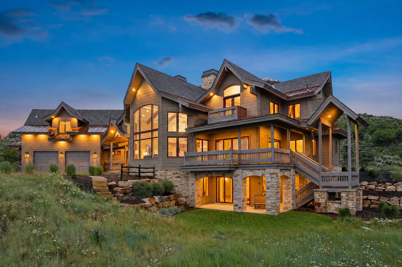 Rustic modern architecture featuring a stone and wood siding exterior