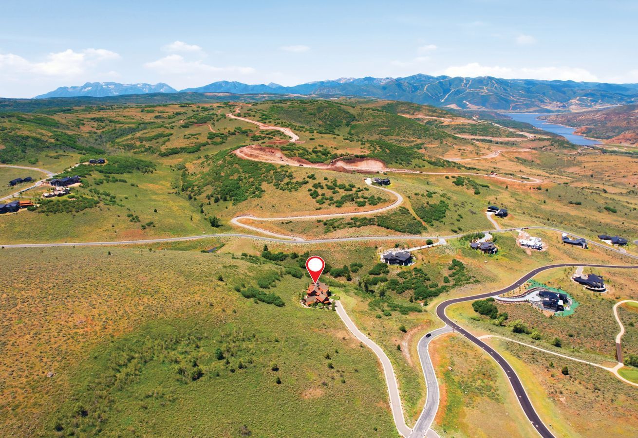 Expansive property with a mountainous backdrop