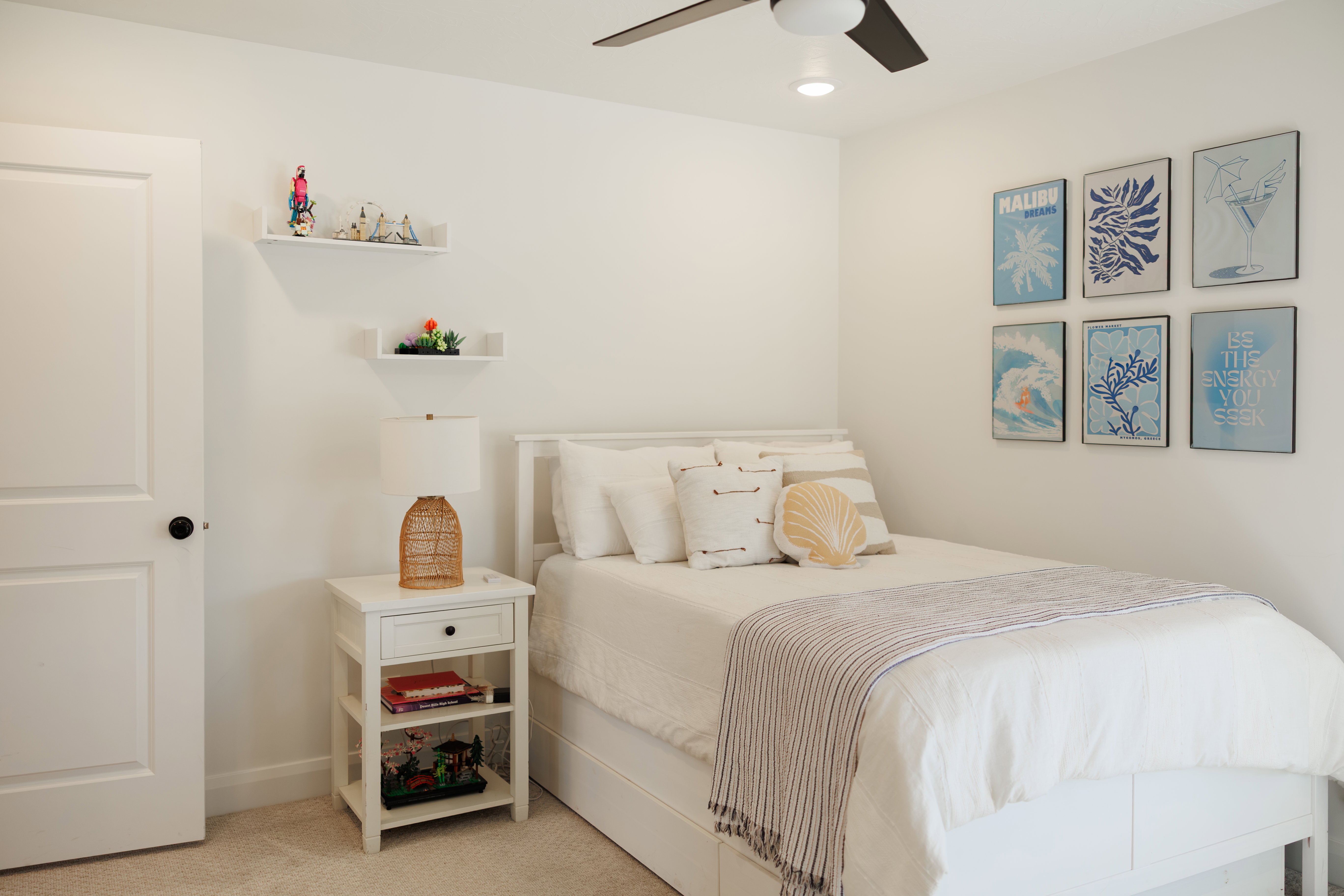 Bedroom featuring white walls and neutral carpeting