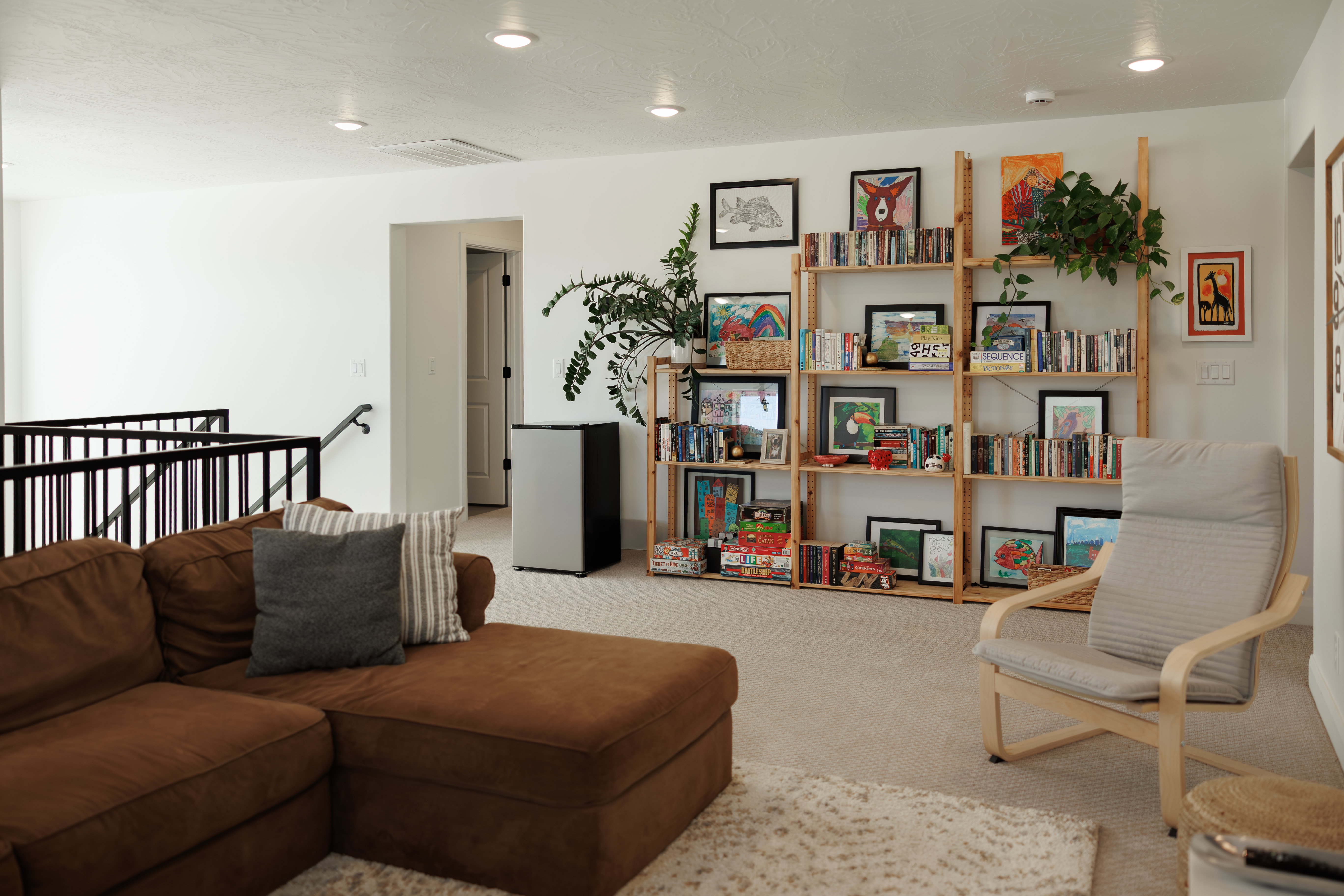 Carpeted recreation area with recessed lighting
