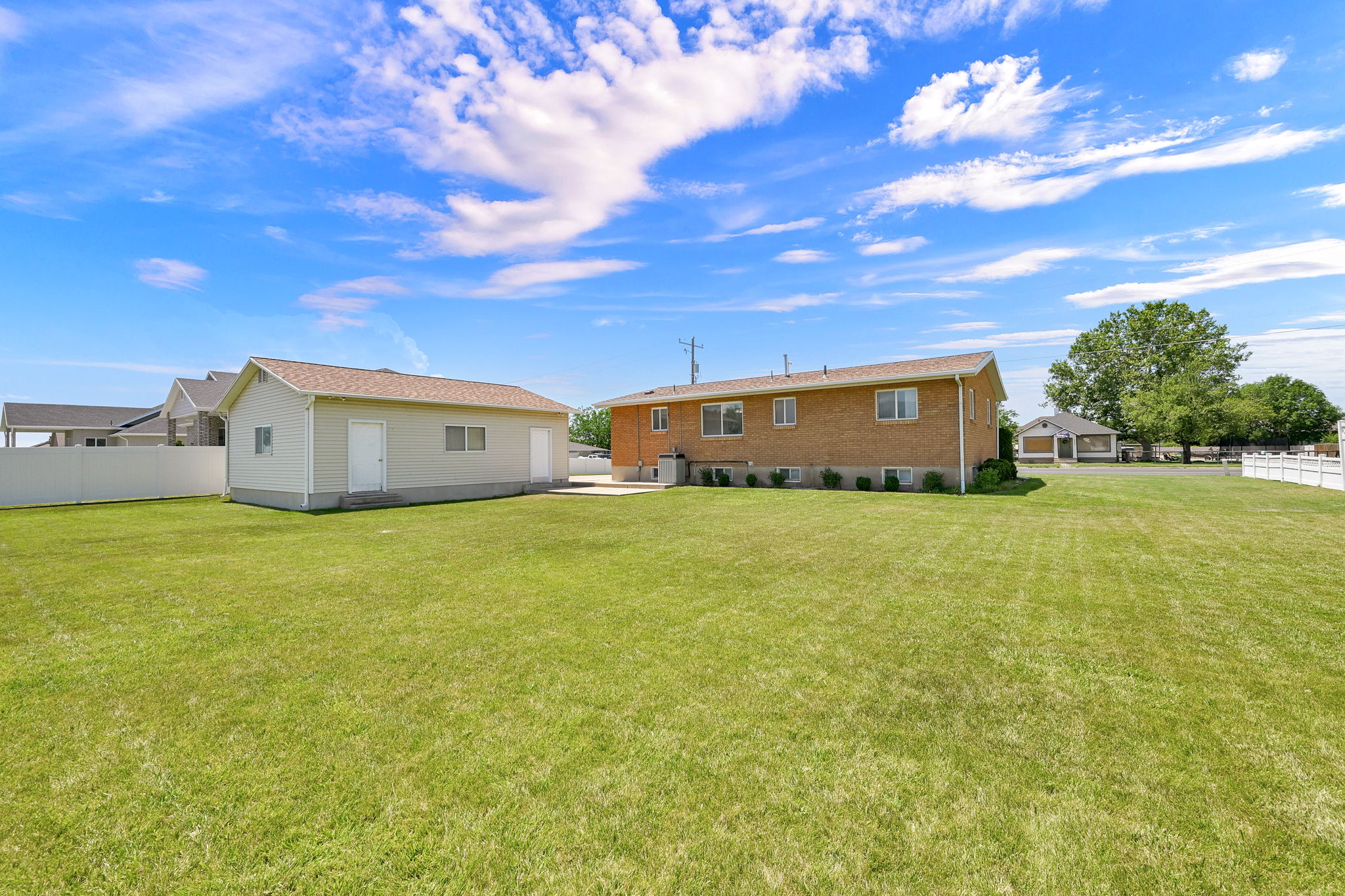 Expansive green lawn providing ample outdoor space