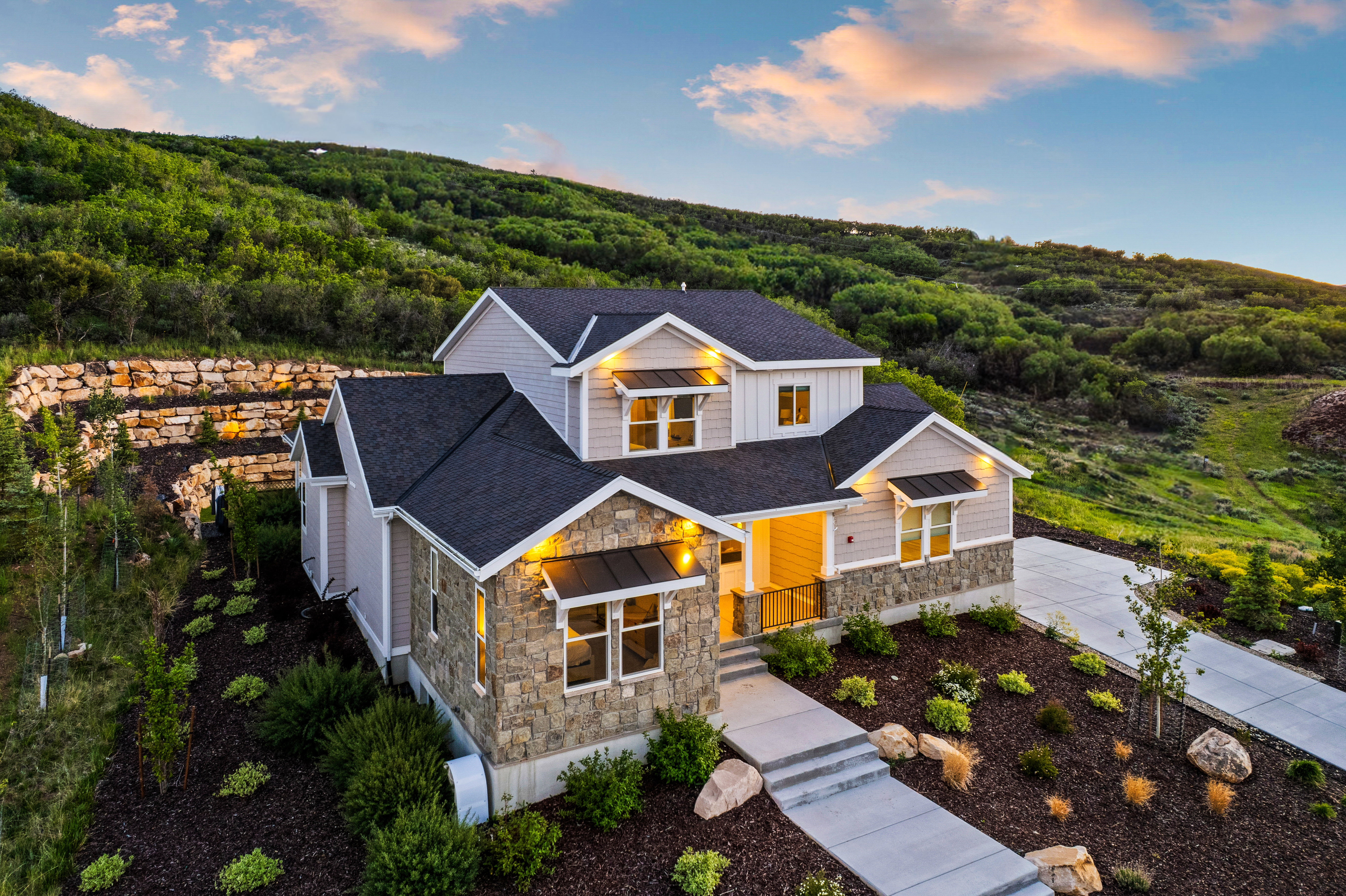Contemporary home with stone and siding exterior