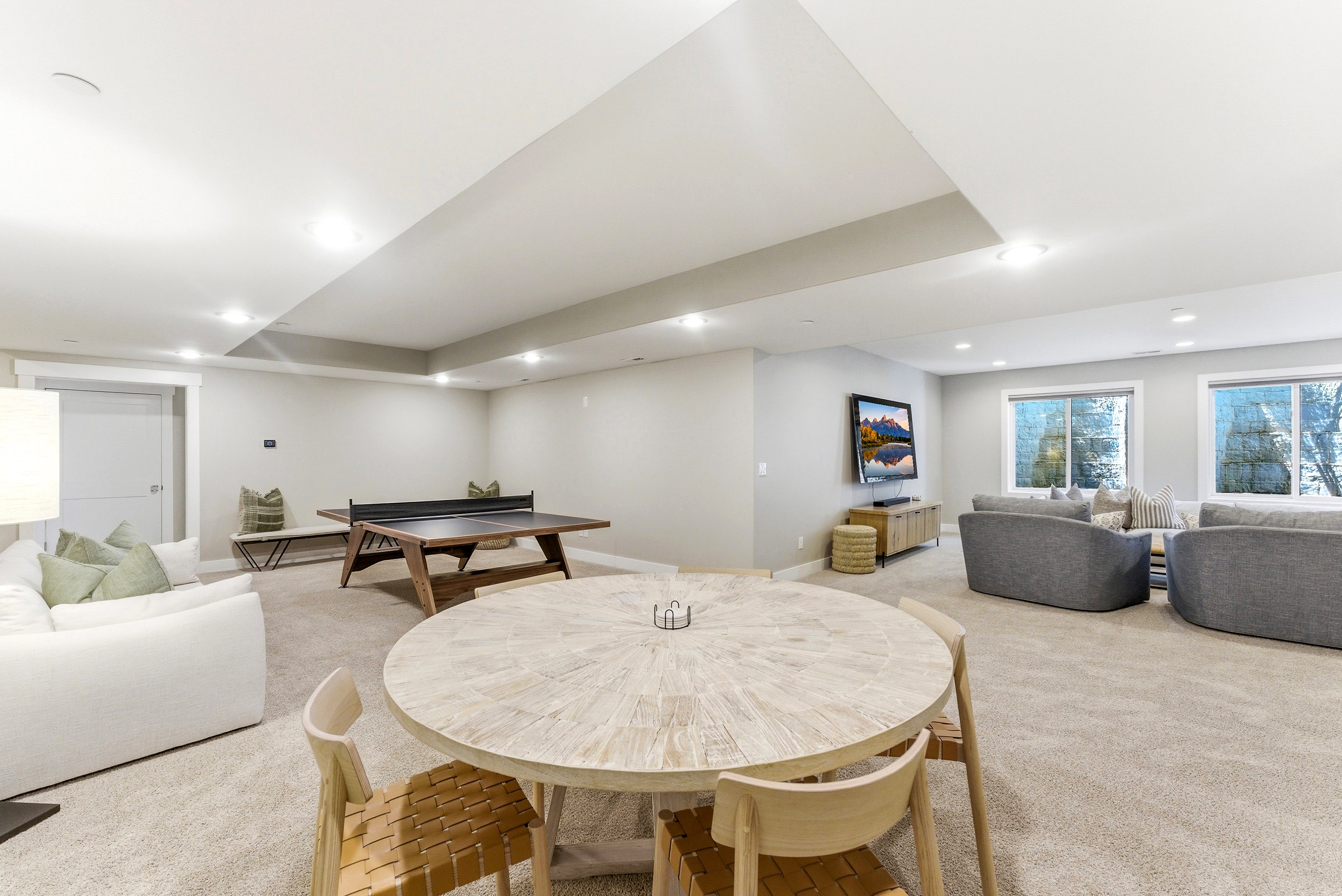 Spacious lower level featuring plush carpet flooring and recessed lighting throughout