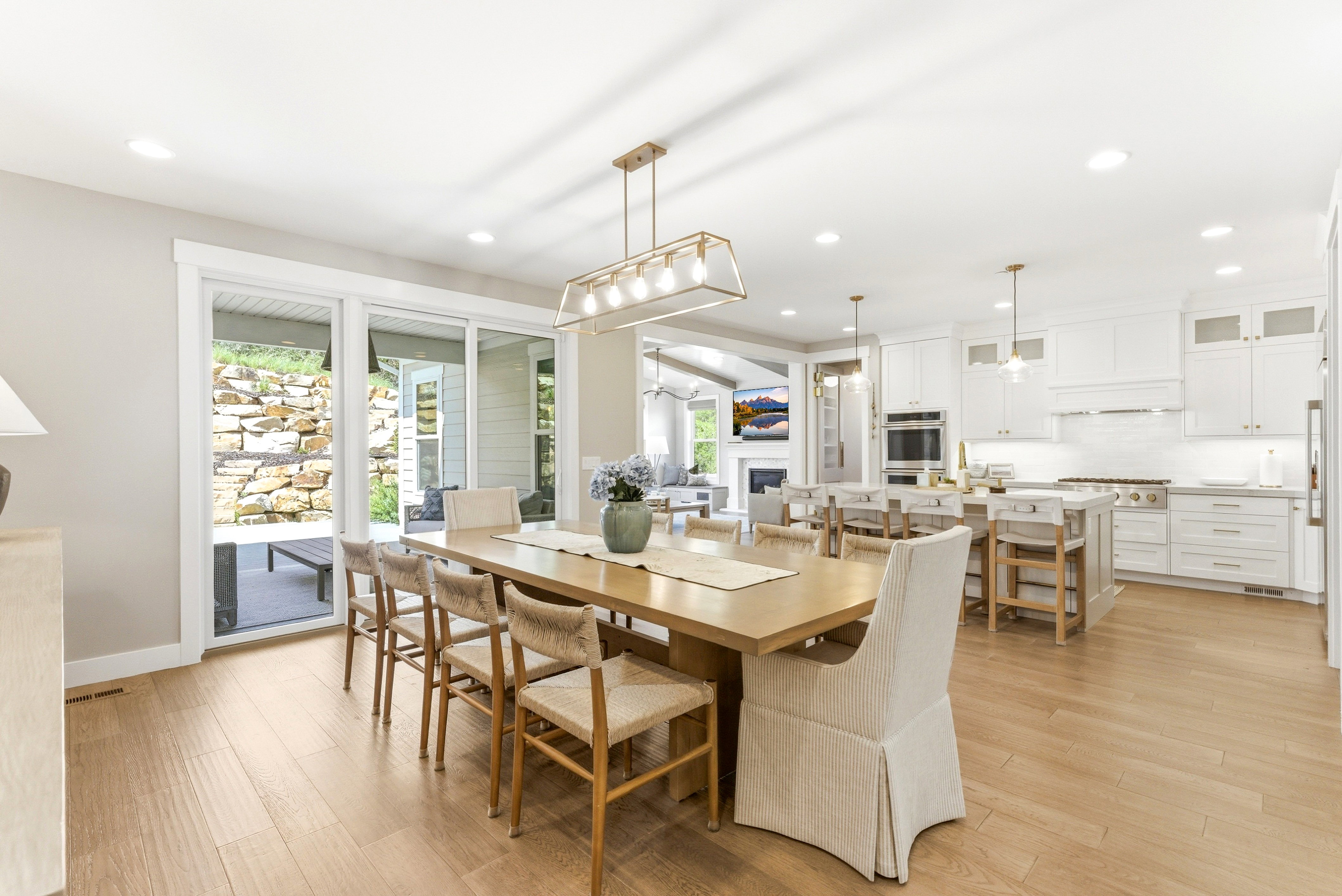 Open-concept living space with wood-finish flooring throughout