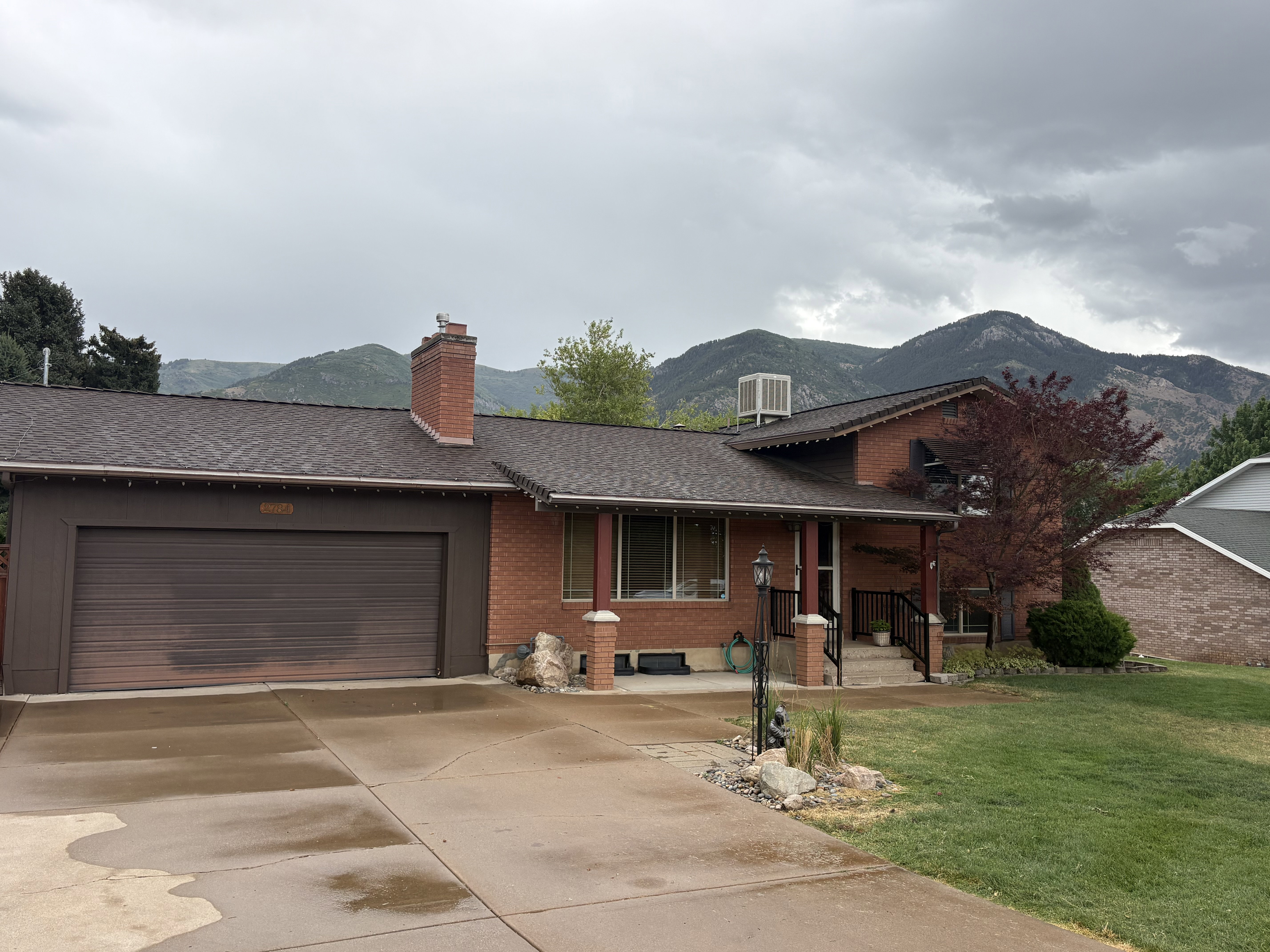 Front of the home, mountains in the background