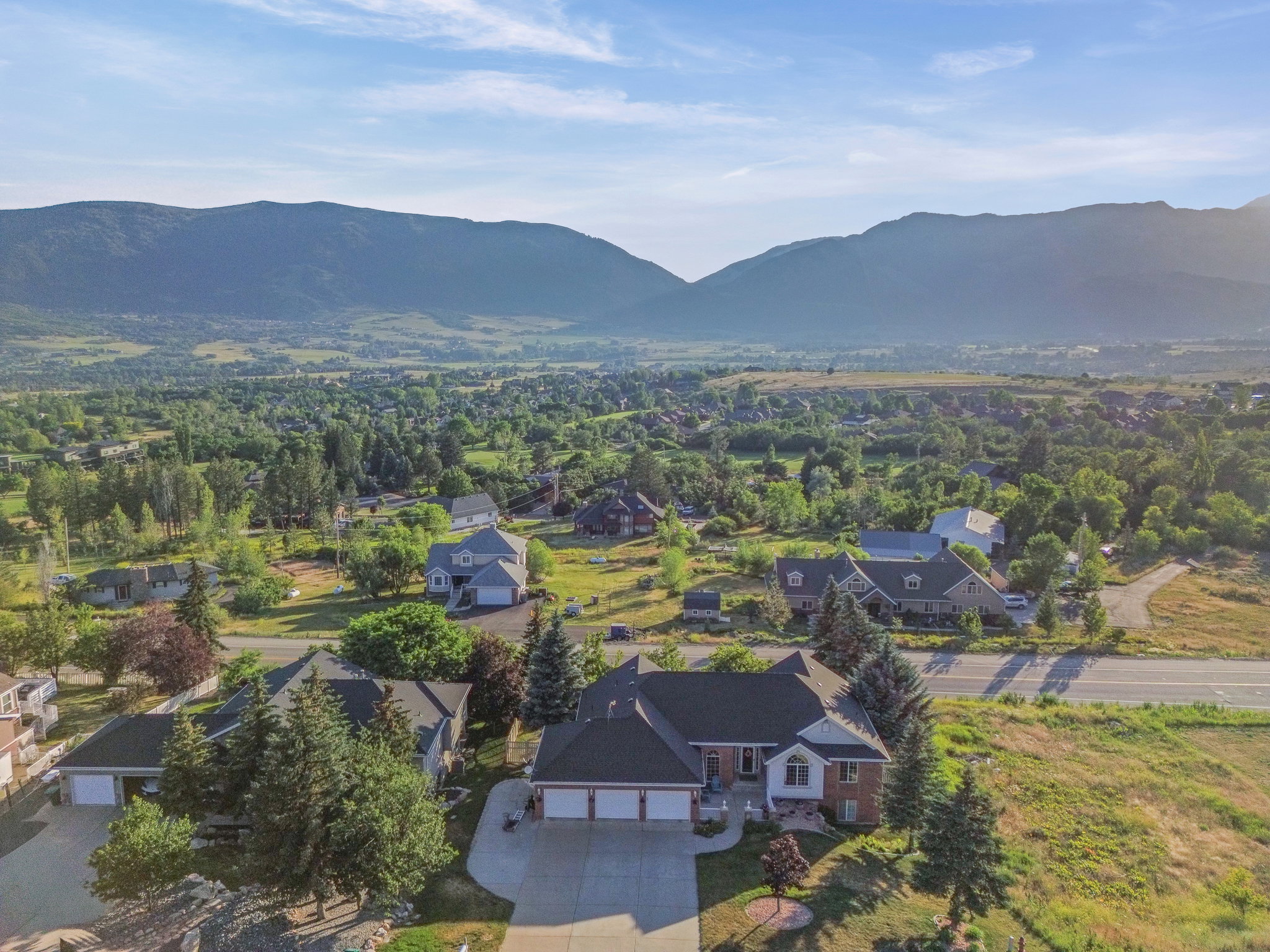 Expansive valley landscape with distant mountains