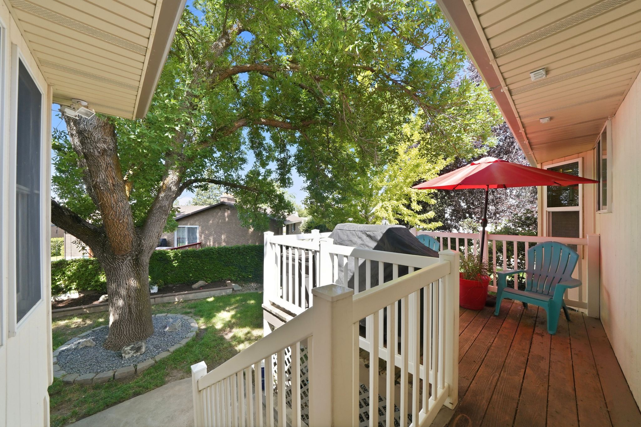 Outdoor deck with and white railings