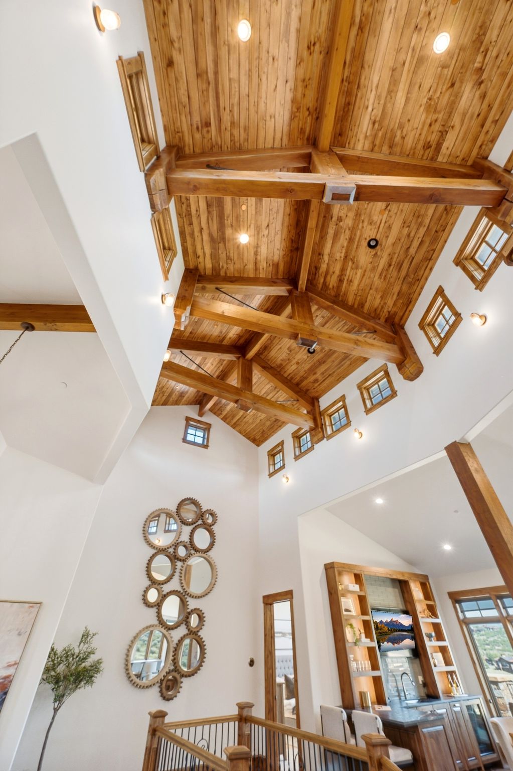 Vaulted wood-plank ceiling with exposed wood beams
