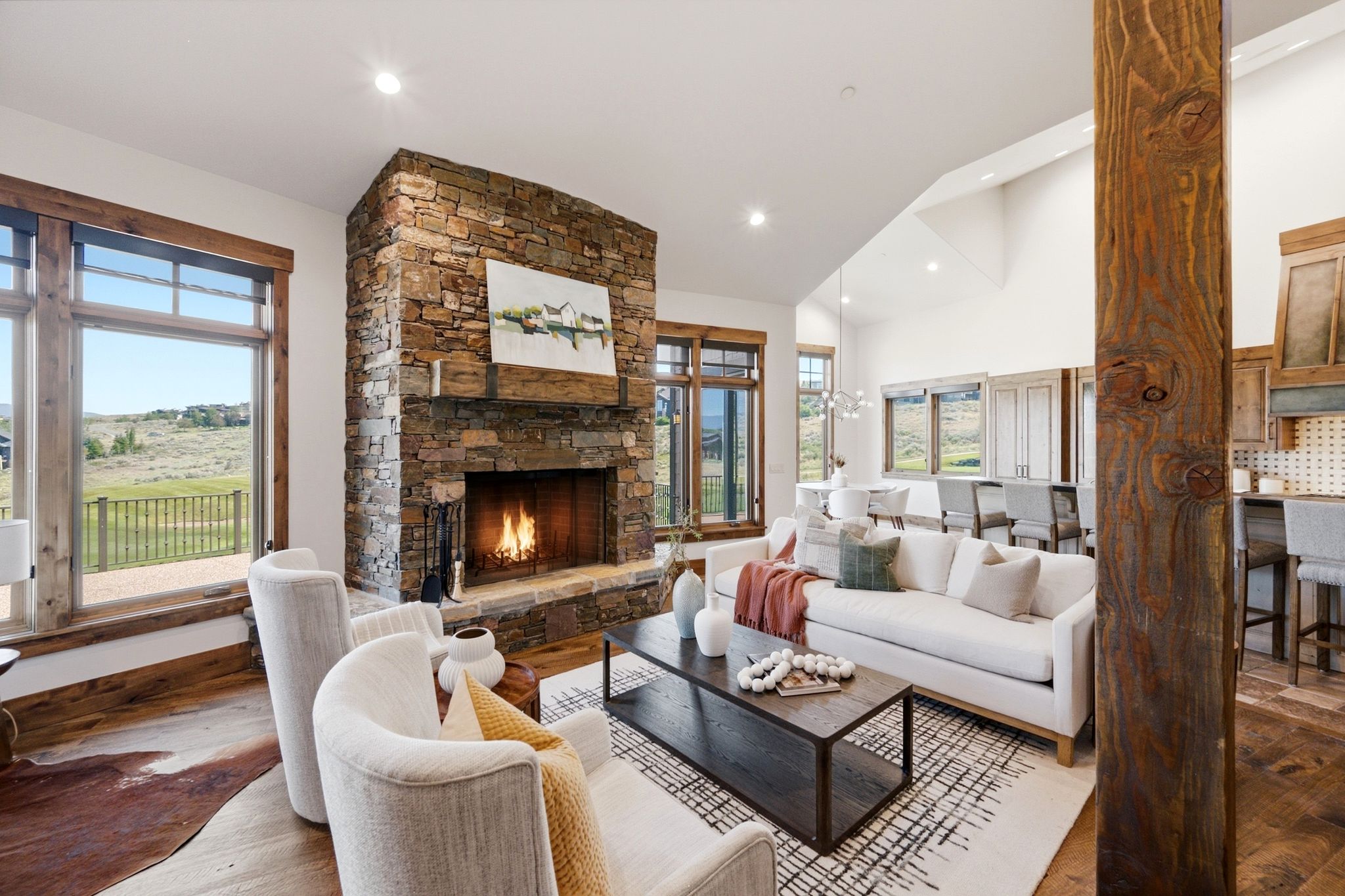 Stone fireplace with wood mantel