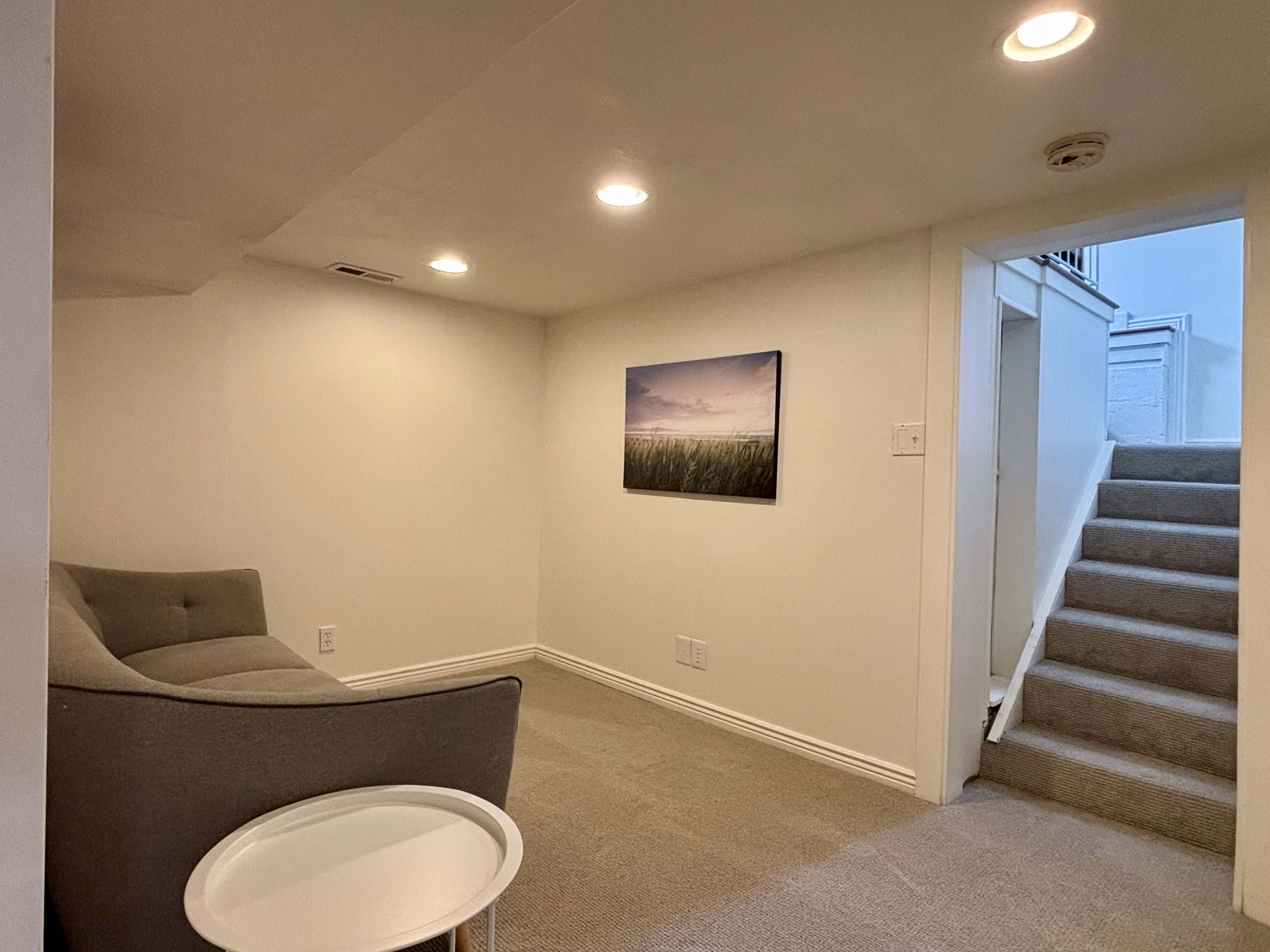 Carpeted room featuring recessed lighting and white trim