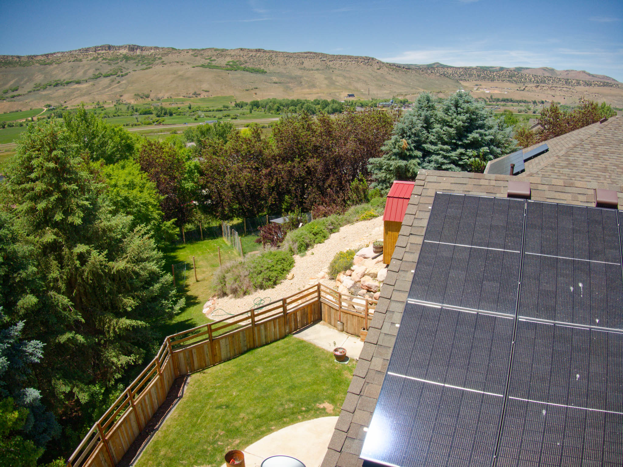 Rooftop solar panels installed on a shingle roof