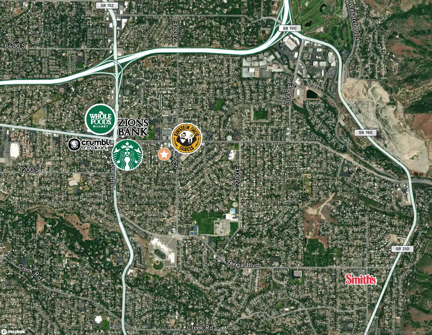 Aerial Map. Displaying commercial entities and infrastructure within the property's operational area